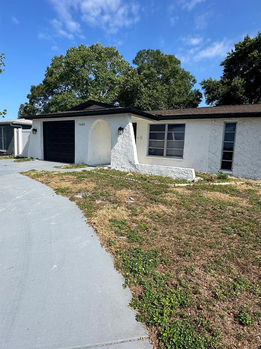 Welcome to 7605 Embassy Blvd, a cozy and well-maintained single-family home offering comfort and convenience in the heart of Port Richey. Features You'll Love: 3 Bedrooms / 2 Bathrooms Spacious enough 1,278 sq ft of living space with an open, functional layout. Bright kitchen with plenty of cabinet space. Tile and carpet flooring for easy care and comfort. Central heating & cooling to keep you comfortable year-round. Attached garage plus driveway parking. Fenced yard with room to play. Location Highlights: Located in a quiet residential neighborhood, this home is close to shopping, dining, schools, and only a short drive to the beautiful Gulf beaches. Easy access to US-19 makes commuting simple. Security Deposit: One month's rent (due at signing )Lease Duration: 12 months Application Fee (non-refundable )Background & Credit Check Required Utilities: Tenant responsible for all utilities (water, electric, trash, internet, etc.) Pets: Allowed with landlord approval Smoking: Not permitted inside the home