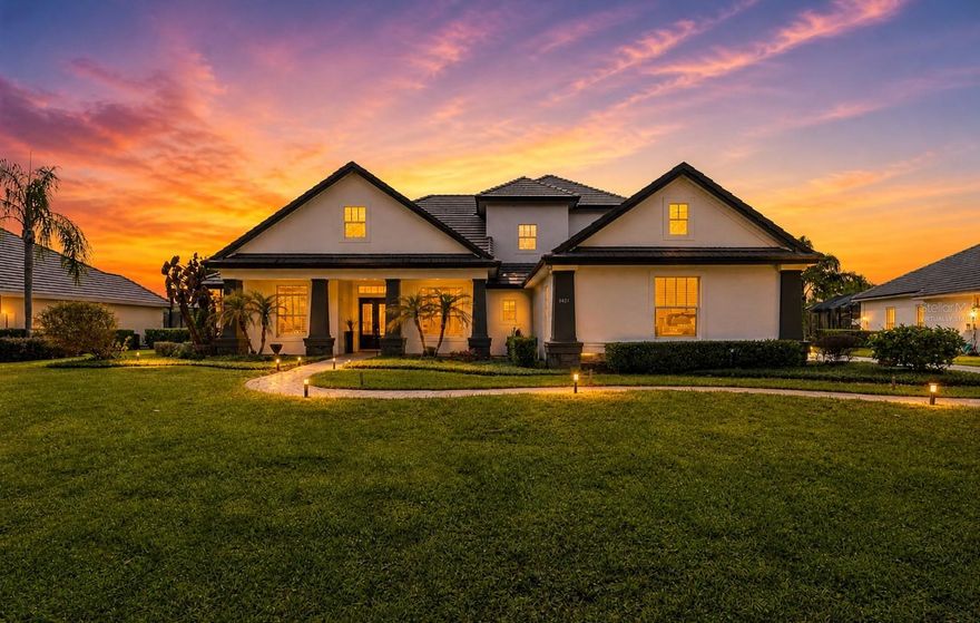 Welcome to one of Windermere’s finest offerings — an impressive 5-bedroom, 4.5-bath estate spanning almost 6,000 sq ft on a premium 0.62-acre direct water-view lot in the exclusive 24-hour guard-gated community of Tildens Grove. This is a luxury build that combines sophistication with fun and accommodates an active lifestyle for family and entertaining:  a custom private movie theater, resort-style pool with spa and panoramic screen overlooking the water, gourmet kitchen, a dedicated gym, plus two generous family / entertainment spaces upstairs and down… all create a floor plan that handles both grand entertaining and relaxed everyday living.  Updates to HVAC, lighting, fixtures, media systems, and wood flooring throughout.  Soaring ceilings with architectural features, and elegant architectural details define every room. Bedroom layout creates a lot of options with one of the downstairs bedrooms featuring a separate side entry just off of the driveway with direct access to a full bathroom - ideal for guests and multi-generational living.  Three-car garage, paver driveway, lush mature landscaping. Tildens Grove offers larger homesites and amenities including tennis, pickleball, basketball, playground, and a scenic park. Minutes to Disney World, Restaurant Row, Windermere Chain of Lakes boat ramp access, top-rated schools, quick SR-429 access for easy day trips to the beach, and approximately 30 minutes to Orlando International Airport.  Luxury, privacy, and convenience — all in one remarkable home.  Owners have this priced right so don’t delay in setting up your private showing today.