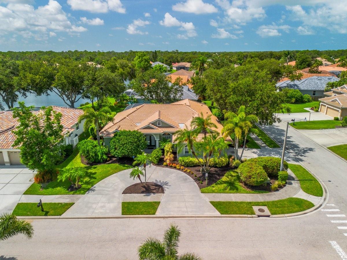 Welcome to your dream home! This stunning, custom-built 3 bedroom, 3 bathroom residence perfectly blends luxury, comfort, and location for the ideal Florida lifestyle. This home is nestled in a highly sought-after neighborhood offering peace, privacy, and a vibrant community feel with low HOA fees. It is situated on an over-sized corner lot, with exceptional lake-views, and just moments from several pristine beaches, the scenic Legacy Trail, Pineview School plus other nearby “A-Rated” public schools, and Oscar Scherer State Park. Being centrally located, you will enjoy all the amenities Sarasota and Venice have, including arts, entertainment, championship golf, restaurants and shopping. There are numerous property features, including: 3 spacious bedrooms, each with ample natural light and generous closet space, 3 luxurious bathrooms featuring designer fixtures and upgraded finishes, inviting living and dining areas with soaring ceilings and panoramic lake views, gourmet kitchen with custom cabinetry, granite countertops, and stainless appliances, a dedicated office with custom cabinetry, expansive screened lanai overlooking a sparkling, private pool, perfect for relaxing or entertaining, Primary Suite retreat with en-suite bathroom and direct lakeview access, Professionally landscaped grounds designed for beauty and low maintenance, Attached two-car garage with extra storage, New tile roof (June ’25) with 10-year transferable warranty, New HVAC system (2024), New Hot Water Heater (2024), New pool equipment system (2024), the home is wired and prepped for Standby House Generator, Water Softener System, Urethane Coating on garage floor. Picture yourself starting your mornings with serene lake views, enjoying the day by your private pool, and making memories with family and friends in your spacious, elegantly appointed home. Whether you’re seeking tranquil relaxation or active outdoor adventures, this exceptional property offers it all.