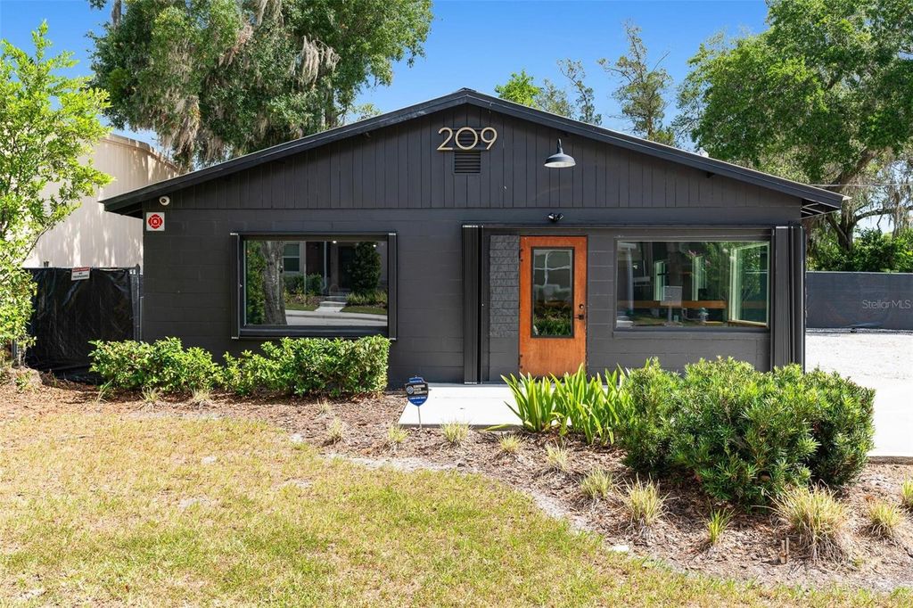 Photo of 209 E Palmetto Ave, Longwood, FL 32750 (MLS # O6325091)
