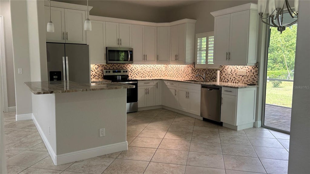 Photo of 20246 Gladstone Avenue, Port Charlotte, FL 33952 (MLS # C7531426)