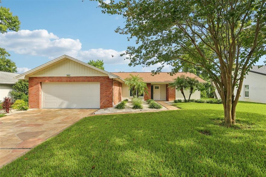 Discover the perfect blend of comfort, style, and community in this beautifully renovated home, nestled in Palm Harbor’s premier 55+ golf community. From the moment you step inside, you’ll notice the thoughtful upgrades: fresh paint, new interior doors, elegant crown molding, and brand-new bathrooms. Luxury vinyl floors flow throughout, while abundant natural light and a rare wood-burning fireplace add warmth and charm. The updated kitchen is a true highlight, featuring granite countertops, self-closing cabinets, and new stainless steel appliances. It opens seamlessly to a cozy sitting area and the oversized Florida Room—perfect for hosting friends or simply enjoying a quiet morning coffee. Your spacious master suite is a private retreat with a den/office, walk-in closet, and spa-style bath with a step-in shower. Say goodbye to popcorn ceilings—this home has been fully modernized with today’s finishes. Major systems have been taken care of so you can move in with confidence: a newer electrical panel, on-demand water heater (2025), HVAC (2020), and a whole-house water filtration system. The roof is protected with Roof Max coating, extending its life and providing peace of mind. Add in a cost-saving deep-water well, and this home is truly turn-key. Highland Lakes is known as Tampa Bay’s best value in 55+ living. Residents enjoy free green fees on three private executive golf courses, plus pickleball, tennis, bocce, shuffleboard, 3 pools and beginner clinics to try something new. The clubhouse buzzes with fitness classes, entertainment, and social events, while the Arts & Crafts Annex features woodworking and creative studios. At Lake Tarpon Lodge, you’ll find a heated pool, fishing pier, picnic areas, and community pontoon boats. Free RV and boat storage, a secure lot, and a private boat ramp make life here even more convenient. This isn’t just a house—it’s a gateway to the lifestyle you’ve earned. Schedule your private showing today and experience why Highland Lakes is the premier 55+ golf community in Tampa Bay!