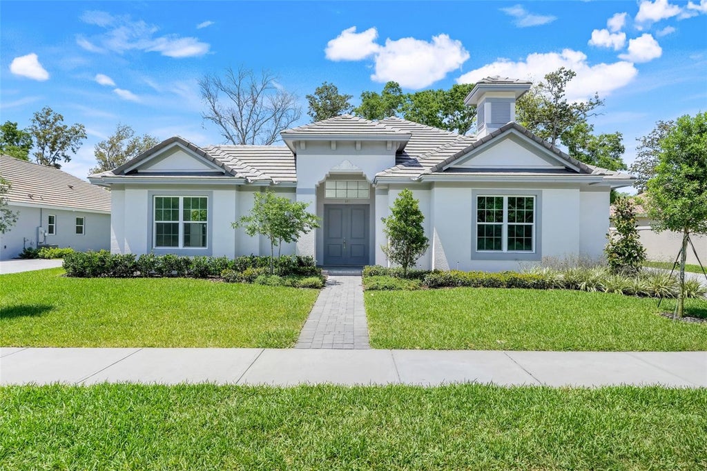 Photo of 132 New Leatherwood Drive, Palm Coast, FL 32137 (MLS # O6436504)