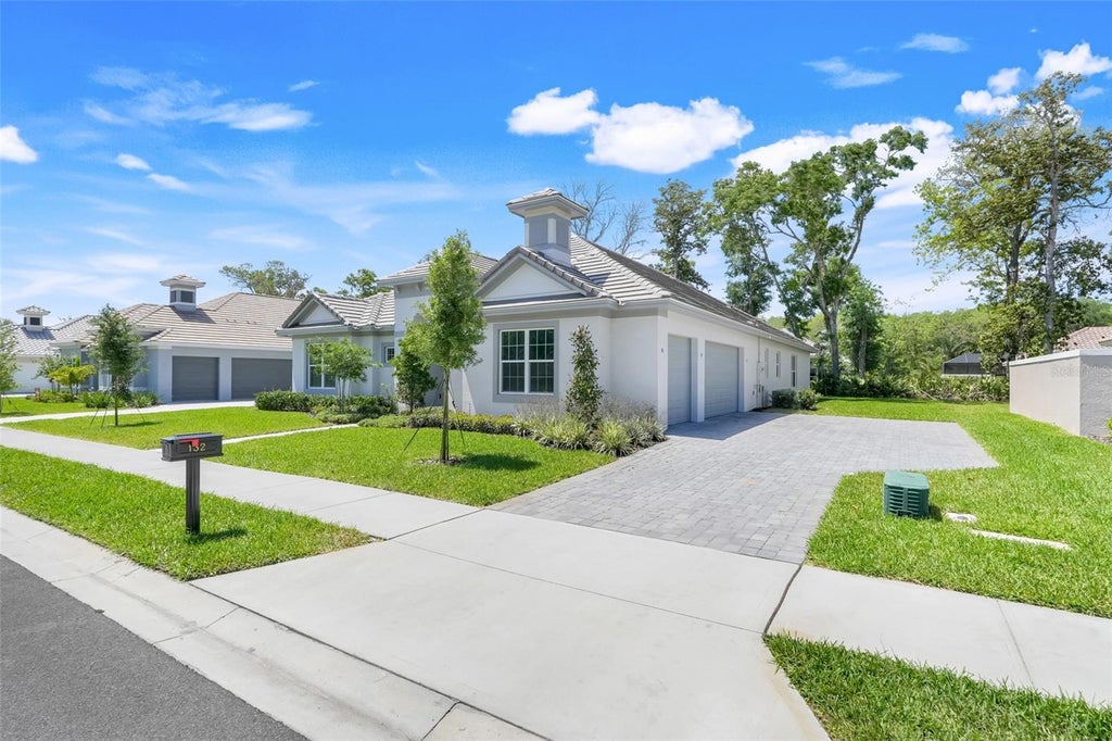 Photo of 132 New Leatherwood Drive, Palm Coast, FL 32137 (MLS # O6436504)