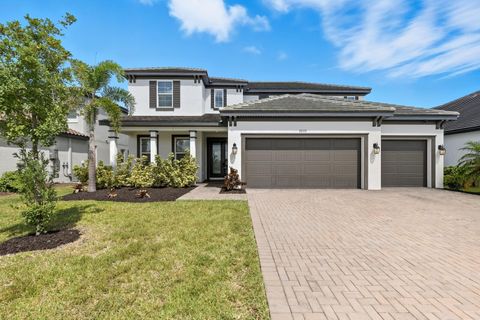 Photo of 2033 Woodleaf Hammock Ct, Bradenton, FL 34211 (MLS # A4666825)