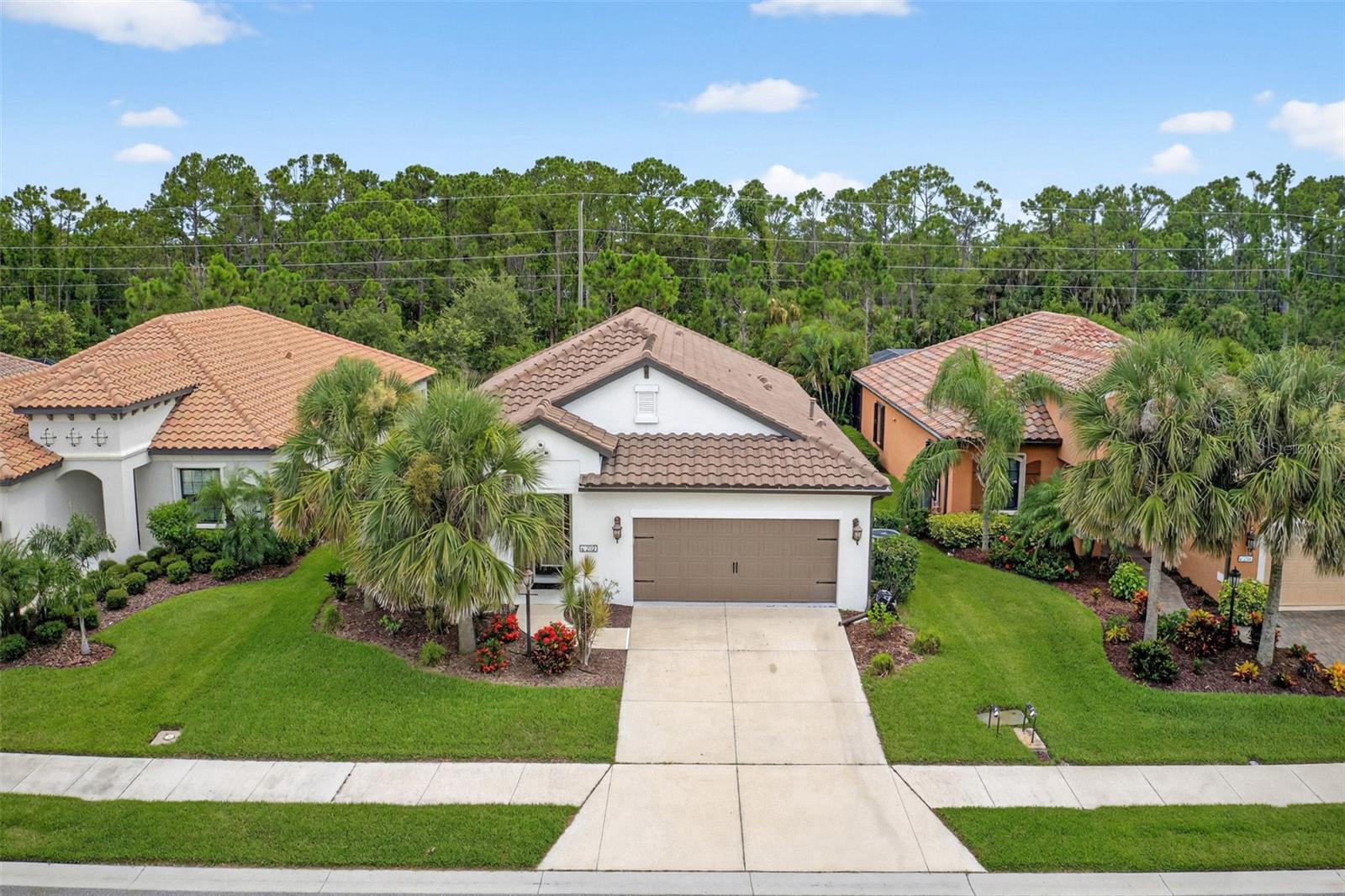 Experience the best of Florida living in this beautifully upgraded 3-bedroom, 3-bathroom pool home with a spacious den and over 2,100 square feet of thoughtfully designed living space in the desirable gated and maintenance free community of Milano. Tucked away on a quiet cul-de-sac, this 2018-built home offers stylish curb appeal with Mediterranean architecture, tile roof, and a paver driveway. Inside, you’ll find an open floorplan with neutral tile throughout the main living areas, a spacious great room, and a modern kitchen featuring granite countertops, stainless steel appliances, gas range, tile backsplash, and a large island perfect for entertaining. The split-bedroom layout provides privacy, with the primary suite offering a generous walk-in closet and a spa-like en-suite bath. Guests will enjoy their own suite with a private bath, making it ideal for multi-generational living. Step outside to your own private oasis with a screened and lighted saltwater pool, covered lanai, and lush landscaping for year-round enjoyment. Additional highlights include hurricane shutters, irrigation system, ceiling fans in every room, and a flexible den or office space. Residents of Milano enjoy low HOA fees and access to a resort-style clubhouse, heated pool and spa, three pickleball courts, two bocce ball courts, and a dog park. Located just minutes from downtown Venice, Nokomis Beach, Legacy Trail, and top-rated schools, this home offers a perfect balance of comfort, convenience, and community lifestyle. Schedule your private tour today. **THIS PROPERTY QUALIFIES FOR A 1% LENDER INCENTIVE IF USING PREFERRED LENDER. INQUIRE FOR MORE DETAILS.**