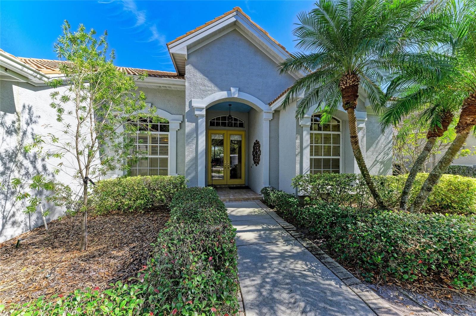 Don’t miss this Arthur Rutenberg/Pete McNabb St Tropez model stunner offering upgrades galore with 4 bedrooms, 3 full baths and a spacious 3 car garage. This popular St Tropez with it’s open floor plan lends itself beautifully to entertaining large or small groups of family and friends. If you are looking for a home beyond the ordinary be sure to include this one in your showings. Bring the outdoors in with screened cabana and lanai featuring a large covered outside living areas, spa and pool. Inside and outside this home you will find architectural features beyond the norm – tray ceilings in master bedroom, and family room, crown molding in master bedroom, living room, kitchen and family room, recessed lighting, custom light fixtures in nook and over bar, 12 foot ceilings in living room, dining and entry, architectural details in the double door entry master bedroom, upgraded tile in baths, upgraded kitchen cabinetry with under cabinet lighting and granite counter tops, built in kitchen desk or coffee bar, two walls of sliders in the family room, upgraded bath cabinetry, 4th bedroom/bonus room with bay window extension and adjacent 3rd bath, and aquarium window overlooking pool and spa. Most recent replacements include water heater 2021, dishwasher 2022, microwave/exhaust 2024, pool pump 2024, pool heater 2024. Located in gated Treymore conveniently located west of I75 in Palm Aire, this highly in demand area is off the University Parkway corridor convenient to UTC Mall, SRQ airport, Downtown Sarasota, and an easy drive to our beautiful beaches. Membership in Palm Aire Country Club is not mandatory, but multiple membership options are available. Low HOA fees and no CDD.