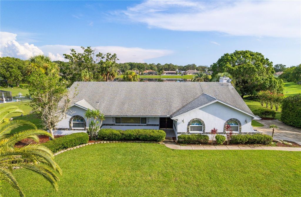 Photo of 8522 Cranes Roost Drive, New Port Richey, FL 34654 (MLS # W7876665)