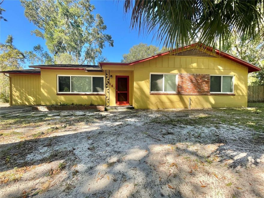 Walk or bike to the University of Florida! Semi-handyperson special!! Architectural roof was installed in 2012, some windows, new insulation and HVAC in 2021, re-plumbed & new water heater in 2017. Mostly needs cosmetics. Parquet wood floors in the great room, dining area, hallway and 3 bedrooms. Flex room/4th bedroom does not have a closet, it has an Armoire. Bonus room behind the kitchen has many possibilities. Large backyard ready for outdoor enjoyment. Great location close to the university, hospitals, movie theater, Publix marketplace and all kinds of shopping and dining options. Ideal for students, rental, or short term rentals like AiRBnB, Verbo, etc.. Concrete driveway plus extra parking (gravel).