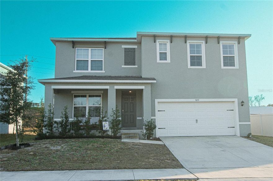 ****Move-In Ready Model Home in Lake Harris Reserve – Largest Floor Plan in the Community - PLUS 1 YEAR HOA CREDIT****
               Welcome to this stunning 5-bedroom, 3-bath home built in 2023, located in the desirable Lake Harris Reserve neighborhood just off Woodlea Road in Tavares. This two-story, all-block construction was the community’s model home—meaning it comes with premium upgrades and thoughtful design throughout.

Step inside to a large flex space at the front entry, perfect for a home office, formal sitting area, or playroom. The expansive open floor plan flows into a beautifully upgraded kitchen featuring granite countertops, stainless steel appliances, and a spacious corner pantry—ideal for entertaining or everyday living.

All bathrooms feature upgraded shaker-style vanities with granite countertops, and the primary suite offers two walk-in closets for exceptional storage and comfort. Upstairs, you’ll find a large landing that can easily serve as a functional bonus space, along with a conveniently located laundry room.

Additional highlights include upgraded switches throughout, high-efficiency LED ceiling fans, smoke and carbon monoxide alarms in every room, a smart garage door opener, and a professionally installed ADT alarm system for added peace of mind. Storage is abundant throughout the home, and the spacious 2-car garage adds even more flexibility.

Outside, enjoy a covered front porch and a backyard with newly planted oak trees already taking root. The neighborhood was also built just outside of the Lake Harris Conservation Area, which will limit future development and maintain the area’s natural beauty, privacy, and peaceful surroundings. Green features, like the reclaimed water irrigation system, enhances efficiency, while the home’s move-in-ready condition truly makes it feel brand new.

As the largest model in the neighborhood, this home stands apart in both size and upgrades. Best of all, it’s less than 2 miles from Downtown Tavares and accessible by golf cart—making trips to dining, shopping, and waterfront attractions effortless.

This exceptional home blends modern design, smart technology, and prime location—don’t miss your opportunity to own one of the premier properties in Lake Harris Reserve.
