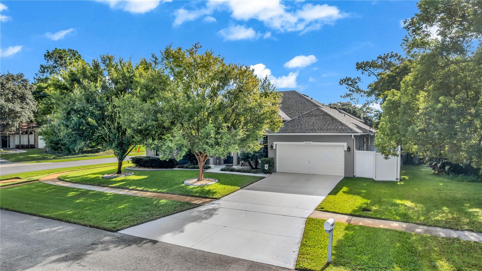 Better than new construction in highly desirable Wedgefield! Luxury living at it’s finest! This better-than-new, nearly 2,400 sq. ft., 4-bedroom, 3 FULL bathroom home with a 2-car garage sits on a sweeping corner lot with incredible curb appeal and NO required HOA. Mr. & Mrs. Clean live here—every detail has been thoughtfully updated with high-end finishes and upgrades galore.
Step inside to soaring 10–12 ft ceilings, 8 ft doors, and disappearing sliding glass doors that seamlessly extend your living space onto the oversized lanai—perfect for entertaining. The brand-new 2024 quartzite counters, cabinets, and stainless steel appliances (dishwasher older) shine in the chef’s kitchen, complete with a large pantry, reverse osmosis water system, and 2021 whole-home water purification system from city water. Save money with the Landscaping watered by the well water system.
The luxurious Master Bedroom feels like a spa retreat with a standalone soaking tub, separate walk-in shower, and dual separate his and hers vanities finished with new quartzite and cabinetry. Bathrooms throughout have been upgraded to match, and the home features new tile flooring in the main areas, plush carpet with premium padding in bedrooms, fresh paint inside & out, new fixtures, 7” baseboards, and updated door hardware.
Major systems are updated for peace of mind: Roof (2021), water heater (2021), A/C air handler (2022), whole-house generator (automatic within 3 seconds), vinyl fencing (2020) in Large yard with New Lux Shed, hurricane shutters, and security cameras. Even the garage has an oversized layout with a workstation.
Located in the golf and equestrian community of Wedgefield, you can enjoy the Optional HOA for a low annual fee, a clubhouse, restaurant, and convenient access to Lake Nona, UCF, the attractions, beaches, and Orlando International Airport. This luxury 4-bedroom, 3-bath home truly has it all—style, comfort, and upgrades you won’t find at this price point.