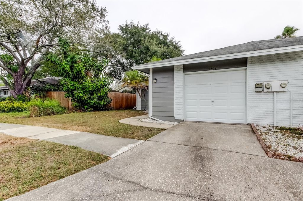 Photo of 4502 Cedarwood Village Drive, Tampa, FL 33624 (MLS # TB8469670)