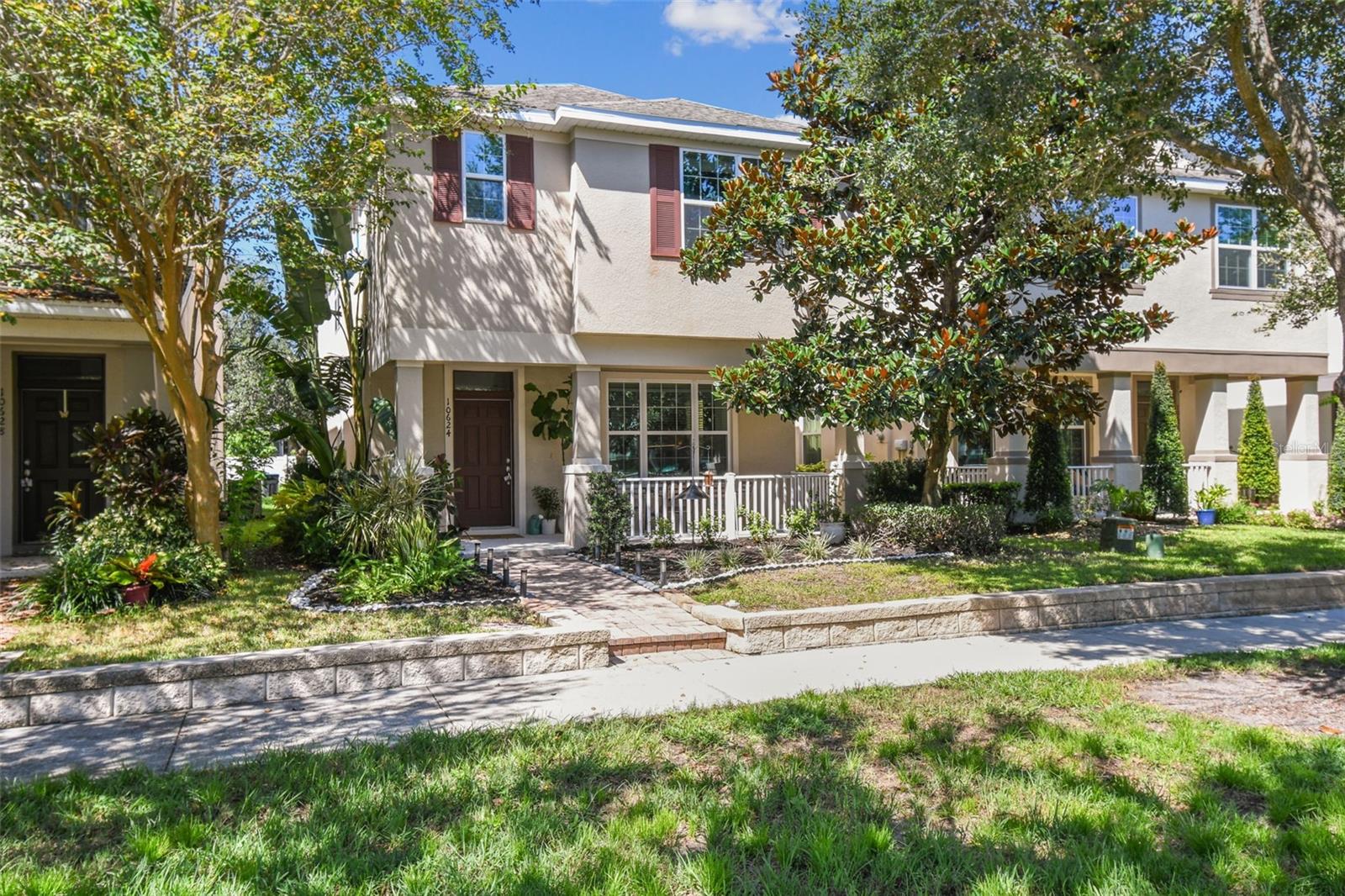 Welcome to this beautiful 4-bedroom, 2.5-bath home in the highly desirable Windermere Trails community. Just minutes from Disney World, you can enjoy nightly fireworks right from your front porch. The kitchen features 42" maple cabinets, granite countertops, and under-cabinet lighting. An open-concept design connects the spacious living and with the kitchen, perfect for entertaining. The primary suite offers a walk-in closet, dual sink vanity, and walk-in shower, while the upstairs loft provides a versatile space for a playroom, office, or media area. Recent updates include a new A/C (2022) and water heater (2023). Windermere Trails offers fantastic community amenities, including a resort-style pool, playground, picnic areas, and scenic walking trails. Located near top-rated (A+) schools, beautiful parks, and a variety of dining and entertainment options, this home combines comfort, convenience, and lifestyle. Don’t miss this opportunity—schedule your private tour today!