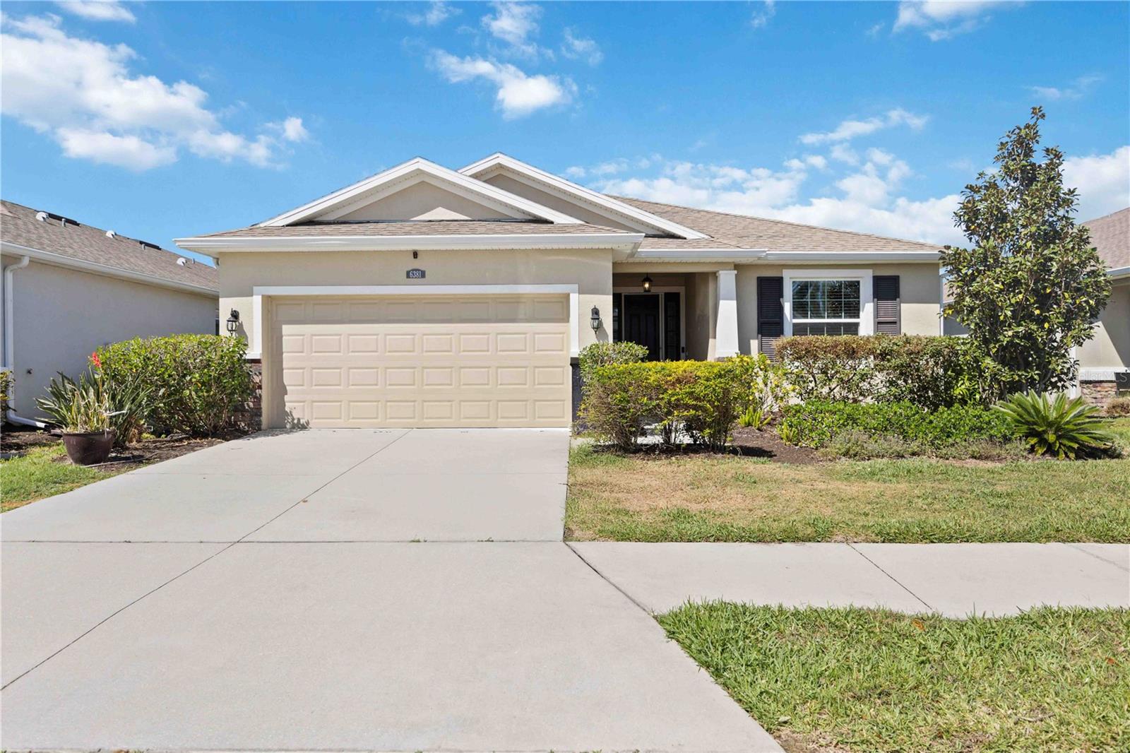 SELLER OFFERING $5,000 towards closing cost assistance! Immaculate three-bedroom, two-bath pool home in the desirable Bent Tree Fairways community. This split floor plan features a spacious tiled great room with an electric fireplace and an open kitchen with granite countertops, stainless steel appliances, a convection oven, and rich espresso cabinetry. Step outside to a covered, screened lanai with a sparkling saltwater pool, offering beautiful sunset views and expansive vistas of the 18th hole at Bent Tree Golf Club. The nicely fenced yard is perfect for pets, with privacy landscaping and a pull-down sunshade for added comfort. Additional highlights include an indoor laundry room and a two-car garage with generous overhead storage. Conveniently located close to I-75, top-rated schools, shopping, dining, and all the best Sarasota amenities.
