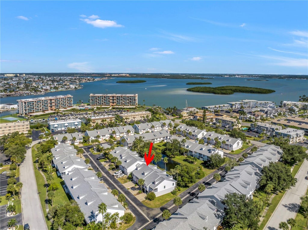 Photo of 159 Sun Isle Cir, Treasure Island, FL 33706 (MLS # TB8561755)