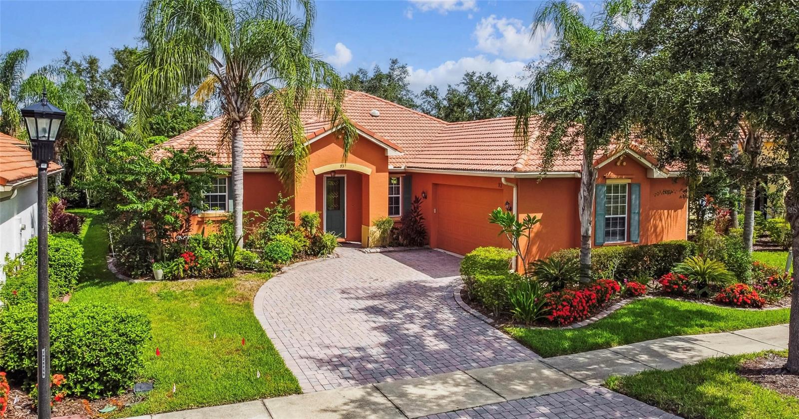 One or more photo(s) has been virtually staged. Located on a street with large grassy esplanade is this beautifully maintained Savoy model home. Designer tile flooring in main living area. New luxury vinyl plank flooring in bedrooms, freshly painted interior, newer stainless steel appliances, crown molding and hurricane shutters are some of the upgrades. Eat-in Kitchen has granite counters, loads of cabinets, pull outs and lots of counter space for those who love cooking and entertaining. The open floor plan makes for great formal and informal gatherings that may extend out to the large covered lanai lined by gorgeous specimen plants and shrubs. Main bedroom suite has a peaceful sitting room for winding down. Bedroom itself has loads of windows and lush greenery to view. It has access to the lanai as well. The ensuite bathroom is flanked by two walk-in closets, has a garden tub, vanity with dual sinks and separate shower. Bedrooms two and three are well sized and share a Jack and Jill full bathroom.
Solivita's amenities include: a manicured SOFTBALL diamond & field - 36 holes of CHAMPIONSHIP GOLF that can be played by joining the Stonegate Golf Club or paying as you go - 2 STATE of the Art AMENITY CENTERS with updated exercise equipment, yoga studio & meeting rooms - 3 restaurants - 14 HEATED POOLS - 17 PICKLEBALL Courts - 9 TENNIS Courts - 4 BOCCE BALL Courts - 4 SHUFFLEBOARD Courts-