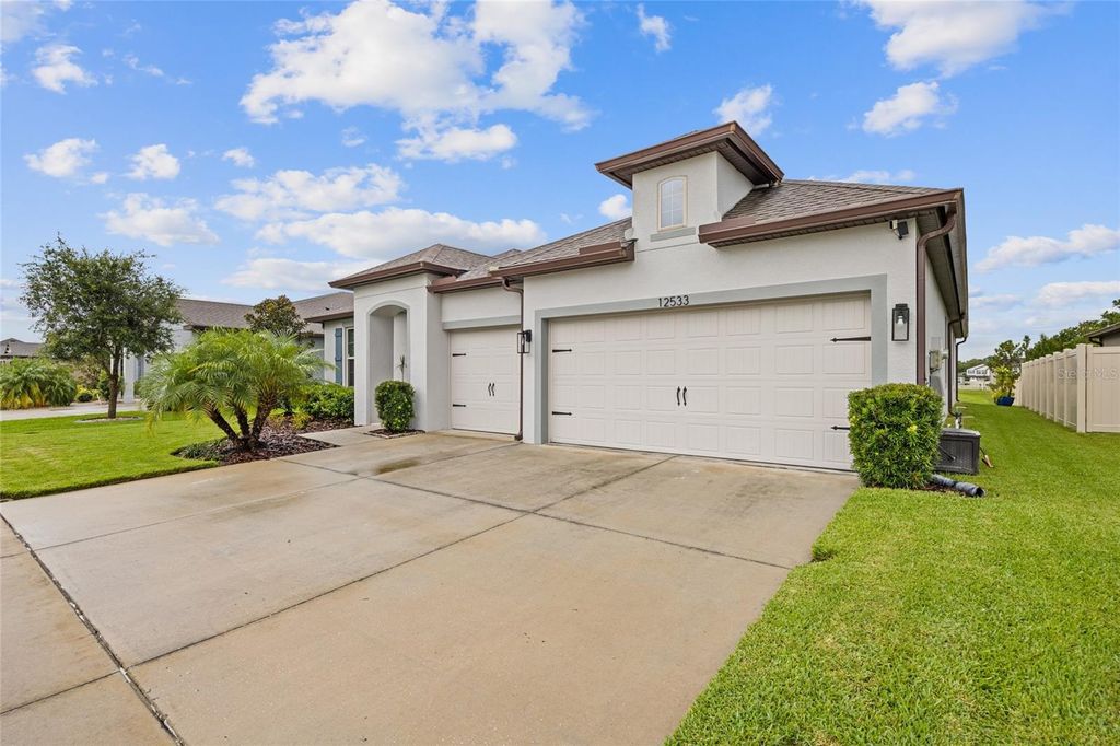 Photo of 12533 Palapa Loop, Spring Hill, FL 34610 (MLS # TB8416893)
