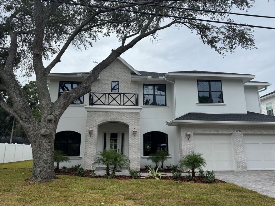 Under Construction. READY JULY 2025!!! BRAND NEW TB Home's Classic French Tudor Style in Palma Ceia West! Over 17' building elevation! Salt-Water Heated
Pool, Outdoor Kitchen & Beautifully Landscaped for ultimate Privacy. 2 Story Block, Impact Rated Windows/Doors & Sprayfoam Insulation!
Stunning interior package; Wide Plank White Oak Flooring throughout, Coffered ceilings in Great Room, Level 4 Smooth Drywall Finish, Solid Core Interior doors, Surround & Sound Pre-wires, Restoration Hardware Lighting throughout, Designer Tiles, Stained wood exterior Ceilings + Many more Unique Appointments. 1st floor holds a large open concept Kitchen w/Custom Shaker Cabinets stacked to ceiling (Under-Cabinet Lighting), Cabinets are a mix of White & Natural Stained Wood, Pot filler, Sub-Zero/Wolf Appliance Package, Farm Sink, Quartz to mimic Marble w/light & bright Breakfast Nook. Formal Dining Room is accessed through Butler's Pantry (Stained Wood Cabinetry & Wine Fridge + Chef's Pantry) complimented w/a stunning Restoration Hardware Chandelier. Study w/glass French doors off of Foyer, Practical Mud-station, Powder Bathroom PLUS 1st floor Guest Suite w/Full Bathroom. Upper floor holds large Primary Suite w/Custom Built-out Closet. 2 good sized Bedrooms share a Jack N Jill style Bathroom, En-Suite Bedroom w/private bathroom. A large well laid out Laundry Room (lowers/uppers/sink) and a 20x20 Media/Game-Room w/kitchenette (microwave + fridge + cabinets + sink) & it's own powder bathroom. Oversized 2 car garage (31' depth on one side & 23' depth on the other side). Gorgeous 5 bedrooms (including 1st floor guest suite), Study w/glass French doors, Dining Room & Media Room make this home functionally perfect! Mabry, Coleman & Plant school district! Great South Tampa location! Home is walk-able by appointment! Photos are from another house that is the same model with staging furniture. Renderings and Photos are for inspiration only and should not be relied upon for accuracy. Additional homes are available, not yet in the mls, please request address. Refer to spec sheet for exact fixtures & finishes.