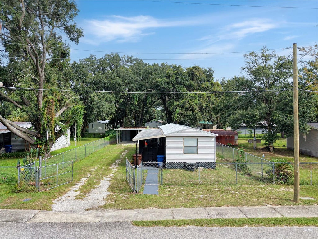 Photo of 718 1st Street, Polk City, FL 33868 (MLS # P4940009)