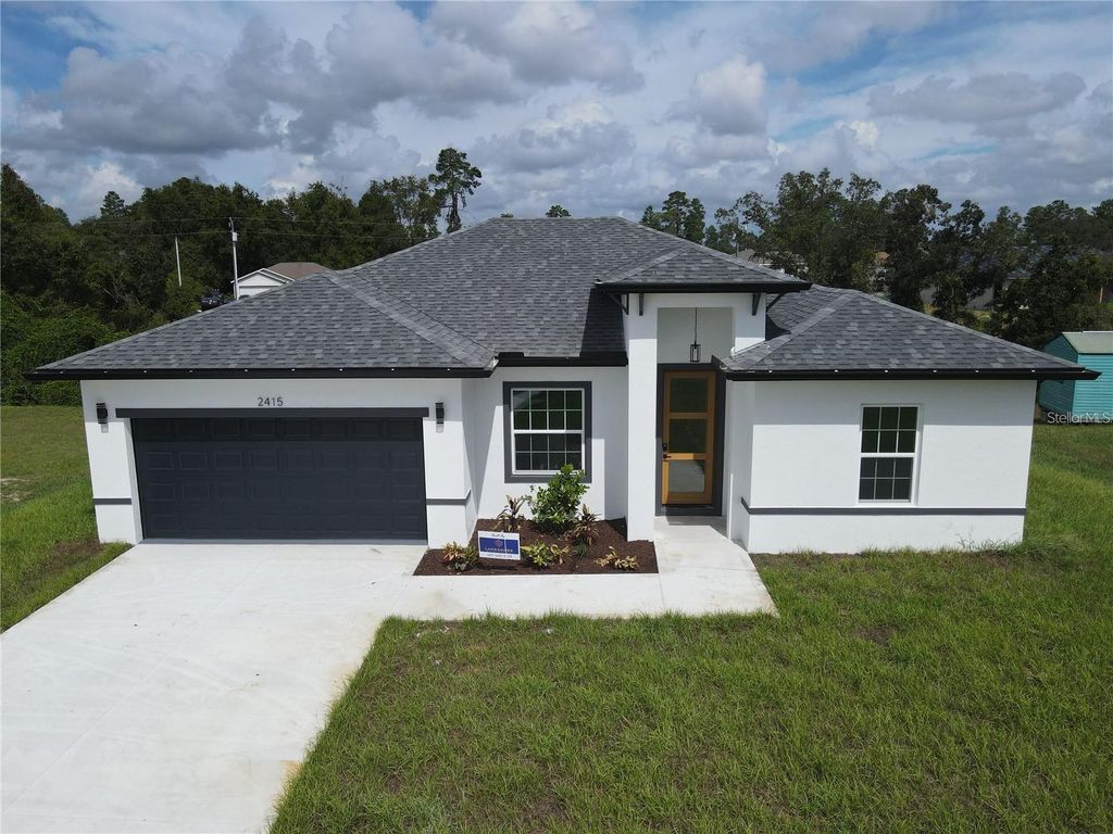 Photo of 572 W Bluster Place, Citrus Springs, FL 34434 (MLS # O6322901)