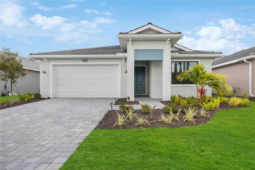 Discover luxury lakefront living in this beautifully crafted Toll Brothers home, ideally located in the sought-after Solstice community of Wellen Park. Perfectly positioned on one of the largest lakes in the neighborhood, this residence offers serene water views and unmatched tranquility. With waterfront lots now completely sold out, this is a rare opportunity to own one of Solstice's premier homesites.

Enjoy peaceful mornings and sunsets from your covered lanai overlooking the lake and fountain, just steps from the clubhouse and dog park. This 4-bedroom, 3-bath home spans 2,134 sq ft and showcases more than $126,000 in premium upgrades, including a $75,000 lakefront lot premium. The spacious yard easily accommodates a future pool or extended lanai, ideal for creating your private outdoor oasis.
Built to the highest standards with hurricane-impact windows and doors, this home provides peace of mind and lower insurance costs. Located outside the flood zone with low HOA fees, Solstice offers both value and lifestyle.

Inside, you'll find elegant neutral tile flooring throughout the main living areas, 8-foot doors, oversized baseboards and casing, and tray ceilings that enhance the sense of space. Each bedroom includes ceiling fans with light kits, while plush carpeting and upgraded padding add comfort underfoot.

The chef's kitchen is a standout, featuring dovetail, soft-close cabinetry, granite countertops, and a premium stainless-steel appliance package with upgraded range and dual electric and gas hookups--giving you the choice for how you love to cook. The open-concept living and dining areas are filled with natural light and highlight panoramic water views through oversized sliding glass doors.

The primary suite offers a peaceful lake view, an expansive walk-in closet, and a spa-inspired en suite bath with upgraded cabinetry, stone countertops, and a frameless glass walk-in shower. At the front of the home, two bright guest bedrooms share a stylish hall bath, while the fourth bedroom features a private en suite bath and walk-in closet--perfect for visiting family or guests seeking extra privacy. Additional highlights include a separate laundry room and a two-car garage with upgraded epoxy flooring.

Residents of Solstice at Wellen Park enjoy resort-style amenities, including a clubhouse, resort-style pool, fitness center, pickleball and tennis courts, dog park, and playground. Located just minutes from CoolToday Park, Downtown Wellen Park, and a short drive to Venice's pristine beaches and historic downtown, this home combines luxury, convenience, and community.

Don't miss your chance to own this exceptional lakefront retreat in one of Southwest Florida's most desirable new communities.