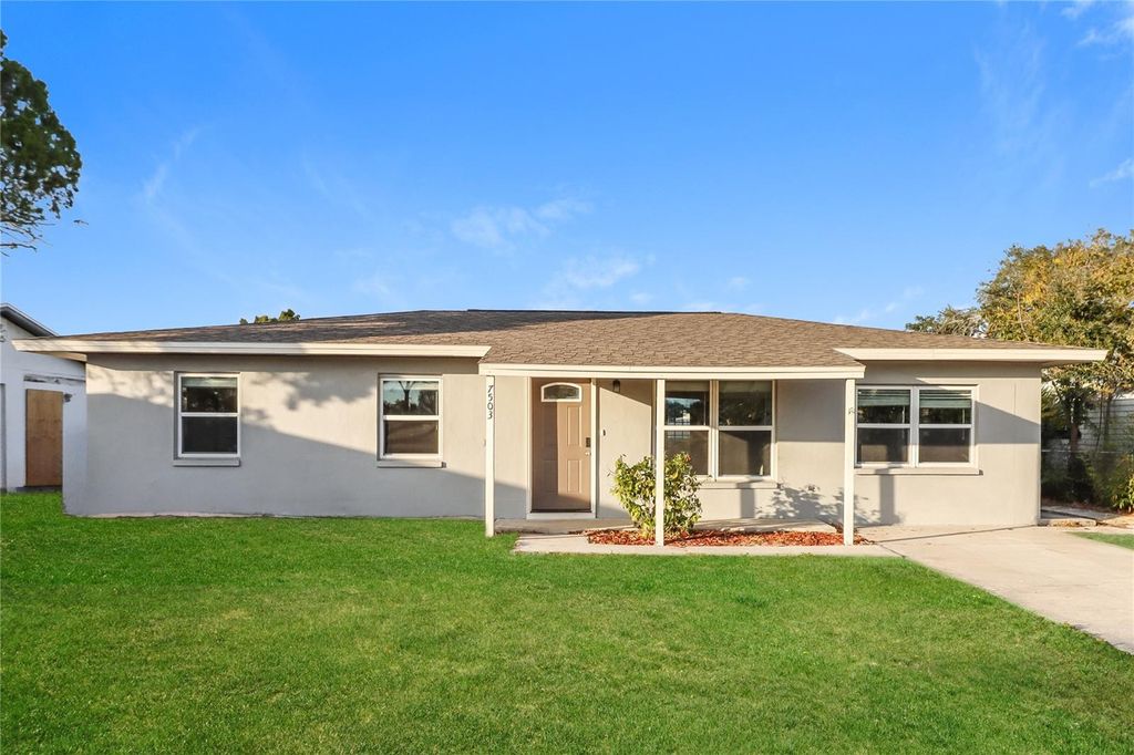 Photo of 7503 W New Orleans Avenue, Tampa, FL 33615 (MLS # O6376740)