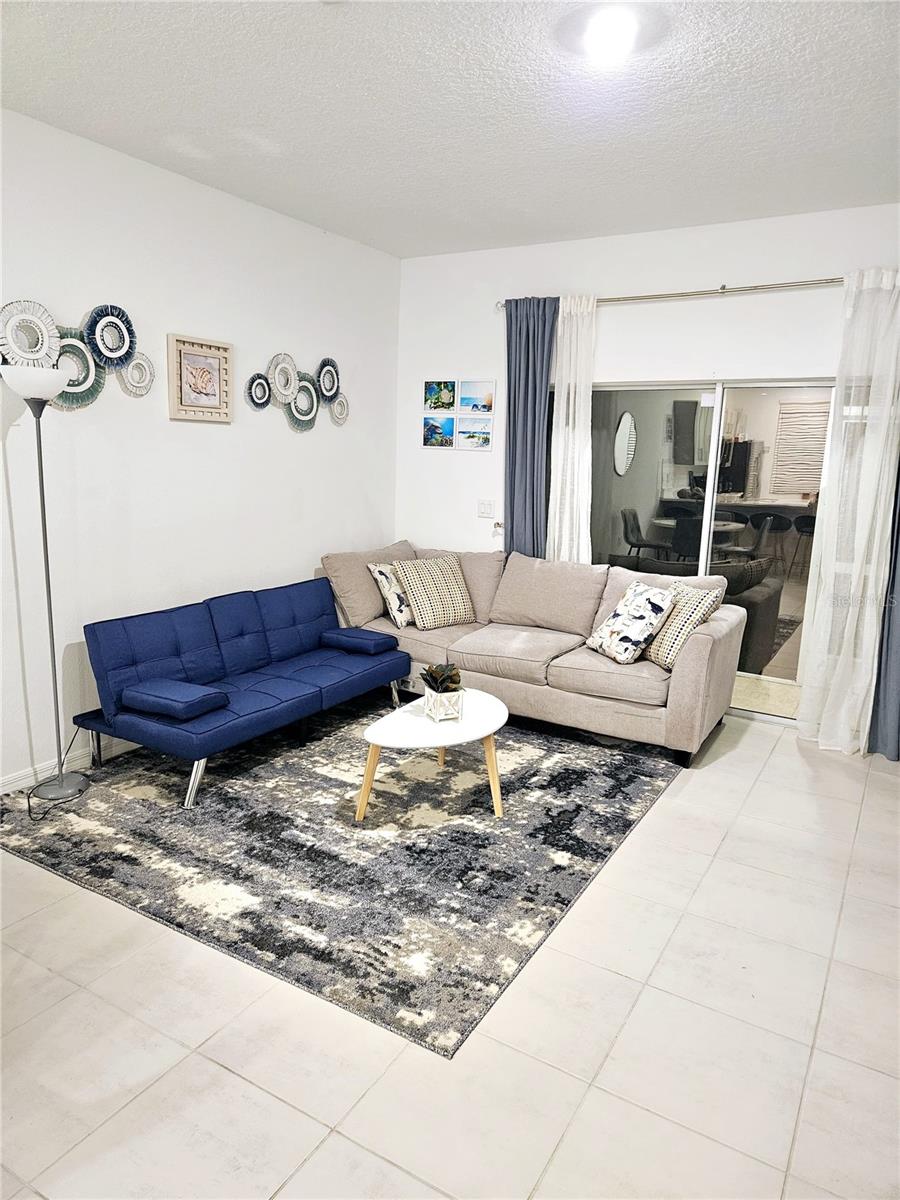 One or more photo(s) has been virtually staged. Live comfortably in this modern furnished townhome located in the prestigious Skye Ranch community in Sarasota. This two-story property offers 2 bedrooms with private en-suite bathrooms, 2.5 bathrooms in total, and an open-concept layout with a contemporary kitchen, perfect for those seeking both style and functionality.
Enjoy access to resort-style pools, a community park with various sports courts, scenic walking and biking trails, a lakefront pier, picnic areas, and more. The home is ideally located near Gulf Coast beaches, hospitals, shopping, dining, and top-rated schools.
The new Skye Ranch School, currently under construction within the community, will serve grades K–8, complementing access to Lakeview Elementary, Sarasota Middle, Riverview High, and Pine View School for the Gifted.
Minimum lease term is one month. Security deposit will depend on the length of stay. One pet allowed. Utilities included: water, electricity, and internet. Please inquire directly for availability. Showings by appointment only.