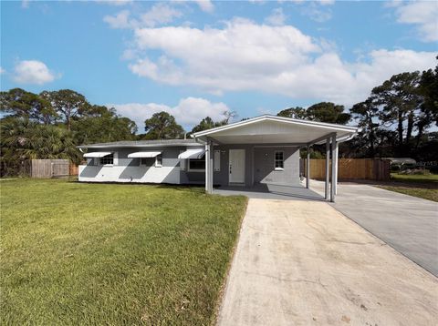 Photo of 1057 Lakemoor Boulevard, Rockledge, FL 32955 (MLS # O6412565)