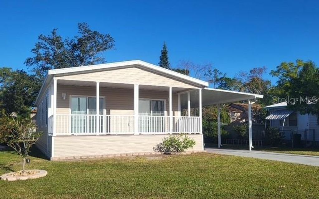 Photo of 1825 Innisbrook Lane, Sarasota, FL 34234 (MLS # A4659294)