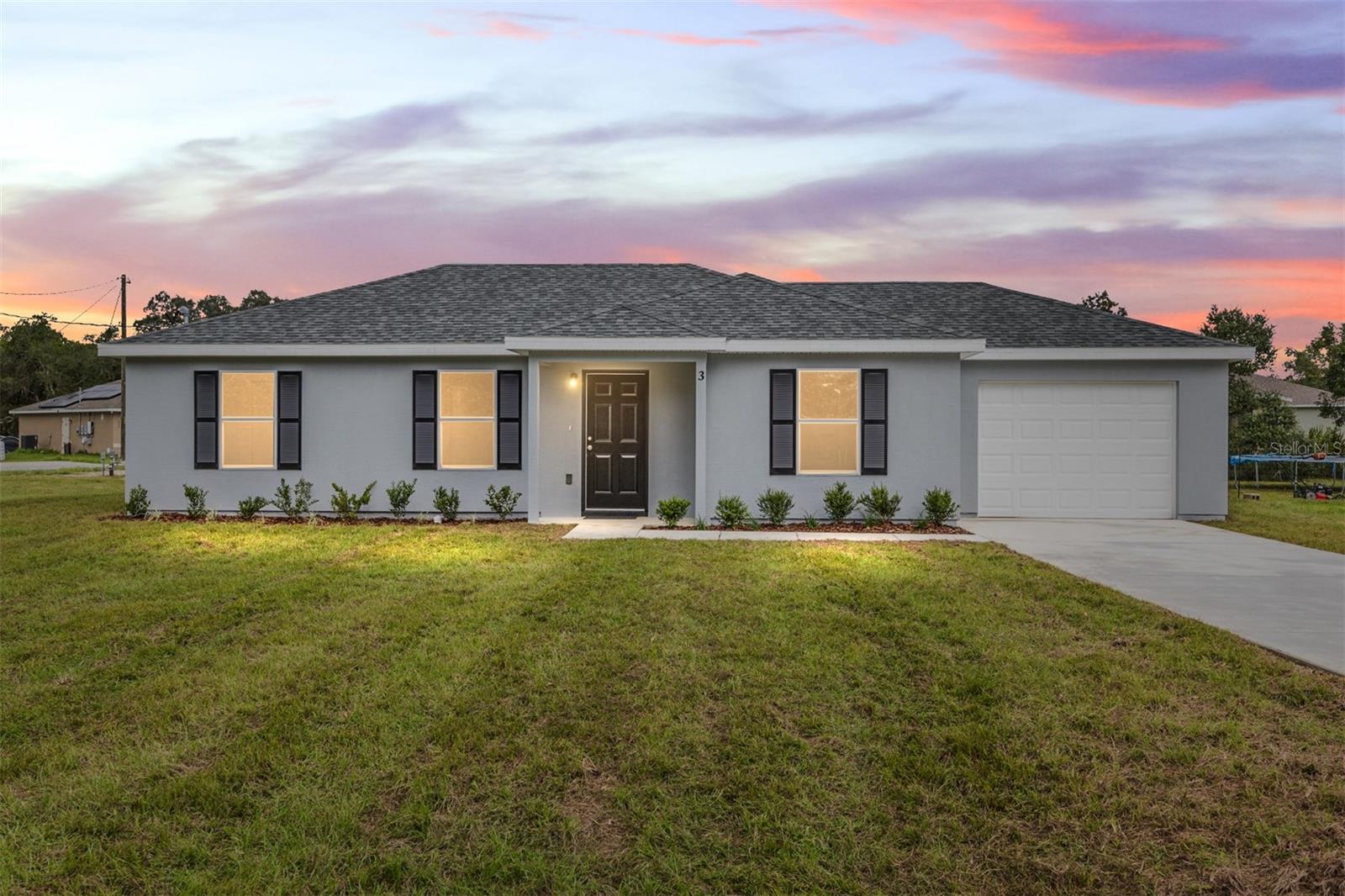 NEW, NEW, NEW! New Construction! New ENHANCED FLOOR PLAN! New REIMAGINED FEATURES! This home blends a timeless design with modern living. From the moment you walk through the front door you will feel the openness with the cathedral ceiling in the foyer, living room, and dining room! Durable ceramic tile flooring flows seamlessly throughout the home. The kitchen boasts stainless steel appliances, sleek quartz countertops, ample cabinetry, breakfast bar and a spacious pantry. Do laundry with ease in the air-conditioned laundry room. The bedrooms have all been expanded to maximize living space. An impressive, attached garage provides convenience and ample storage. This home rests on just under a 1/4 acre lot ~ enough room for the family & pets to play, but not too much yard work. Silver Springs Shores offers easy access to restaurants, shops, healthcare facilities, art galleries and local events, plus outdoor recreation opportunities like parks, lakes, biking, swimming, hiking, kayaking and much more. The Builder is including a 1 year full warranty and a 2-10 home warranty! Any dimensions listed are approximate. Photos/Virtual Tour are to show interior and exterior colors and finishes and may or may not be of this actual listing. Garage orientation and floor plan may vary for actual home.