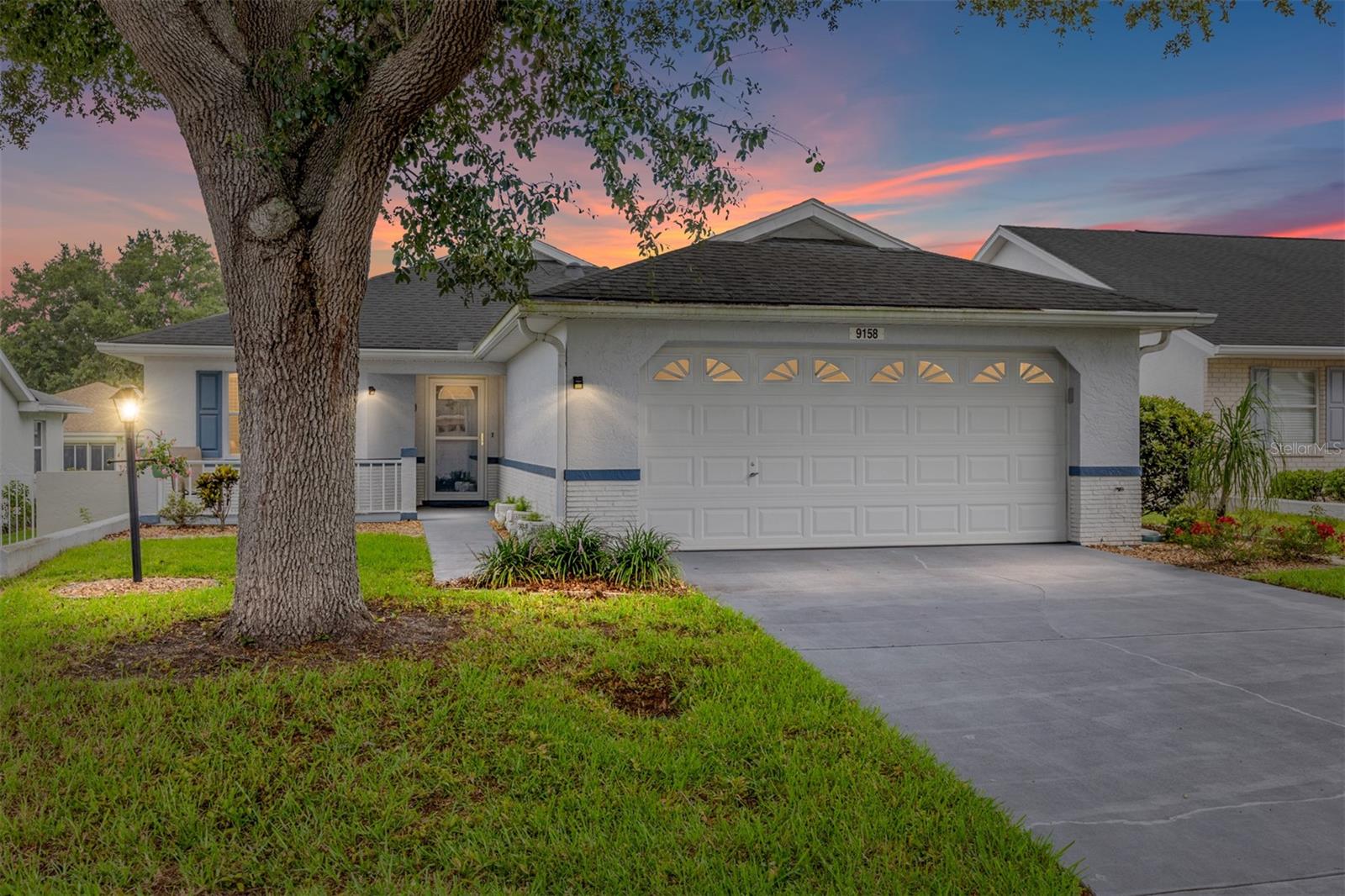 Welcome to this expanded 3-bedroom, 2-bath Franklin model located in the prestigious gated 55+ community of On Top of the World. This light and bright home features an open-concept floor plan with a spacious living and dining area, complete with cozy carpeting and great natural light. French doors lead to a beautifully re-screened L-shaped lanai—an ideal space for entertaining, featuring adjustable vinyl windows, a ceiling fan, upgraded electric circuit, wired for cable, and even includes a mini refrigerator. Best of all, the lanai furniture is included! Enjoy the added privacy of a gated courtyard just off the lanai; an ideal spot for your furry companion to safely roam, or for you to relax with a morning coffee in a peaceful, low-maintenance setting. The galley-style kitchen offers ample white cabinetry with crown molding, granite countertops, stainless steel appliances, and a sunny eat-in nook with a charming bay window. The spacious primary suite includes carpet, a walk-in closet, light-blocking shades, and an en-suite bath with granite counters, wood cabinetry, and a step-in tile shower with bench seating. The guest bedroom is perfectly sized, while the third bedroom—featuring a walk-in closet—makes a great office, den, or TV room. The second full bath includes a tub/shower combo and granite-topped vanity. Additional highlights include: Inside laundry room with washer and dryer included, two-car garage with built-in cabinetry, newer quiet garage door opener, a pull down attic and extra storage space, Roof replaced in 2013, HVAC replaced in 2021. Water heater replaced in 2022. Enjoy a vibrant, active lifestyle in one of Ocala’s most desirable 55+ communities with top-notch amenities and a secure, gated environment. Say goodbye to yard work—your HOA takes care of lawn mowing, shrub maintenance, and basic cable, allowing for a worry-free lifestyle. Residents of On Top of the World enjoy access to an impressive array of amenities including pickleball courts, golf courses, a full-service restaurant and pub, indoor and outdoor heated pools, steam room, sauna and a variety of clubs and exercise classes. Schedule your private showing today!