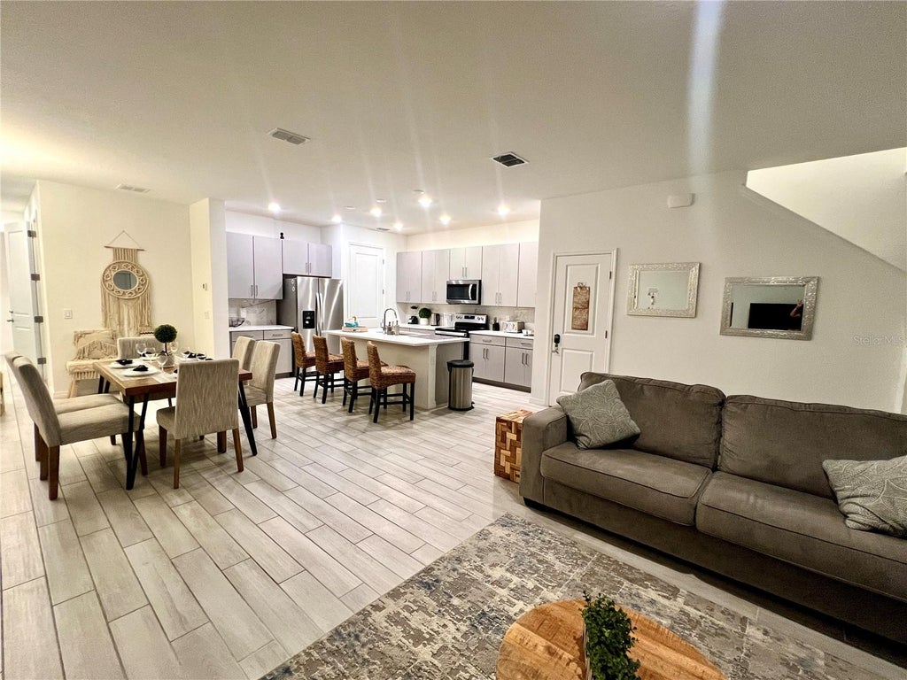 Photo of 844 Benoi Drive, Davenport, FL 33896 (MLS # TB8546275)