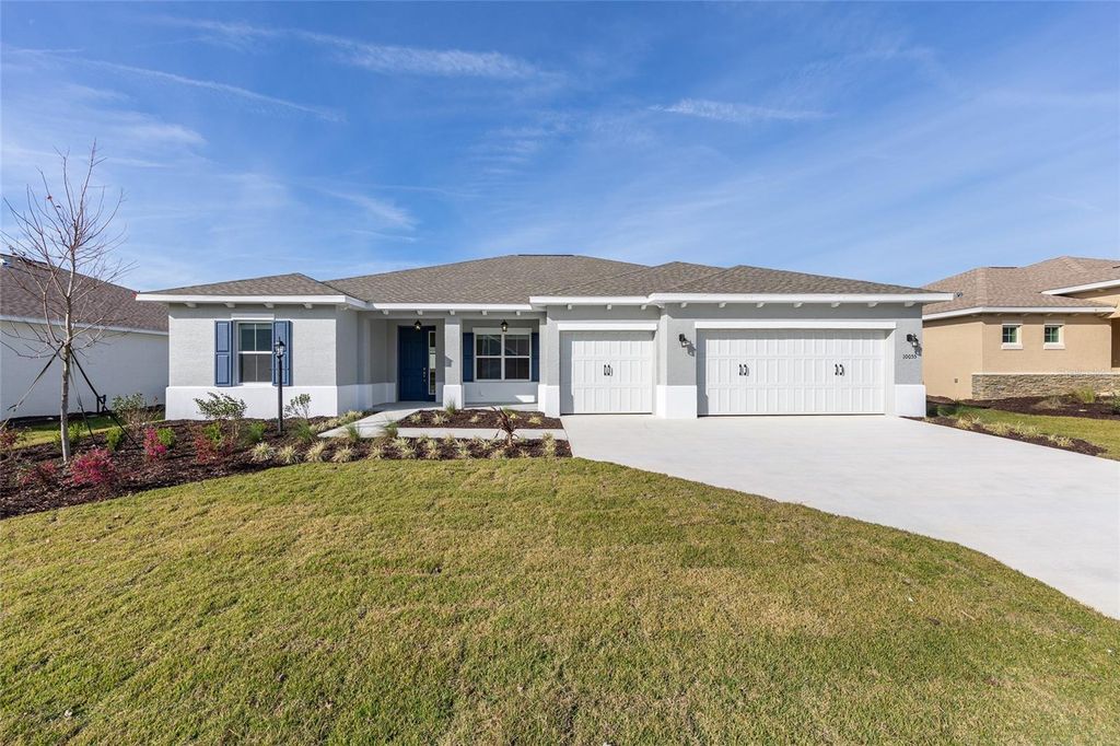 Photo of 10055 SW 106th Circle, Ocala, FL 34481 (MLS # OM717026)
