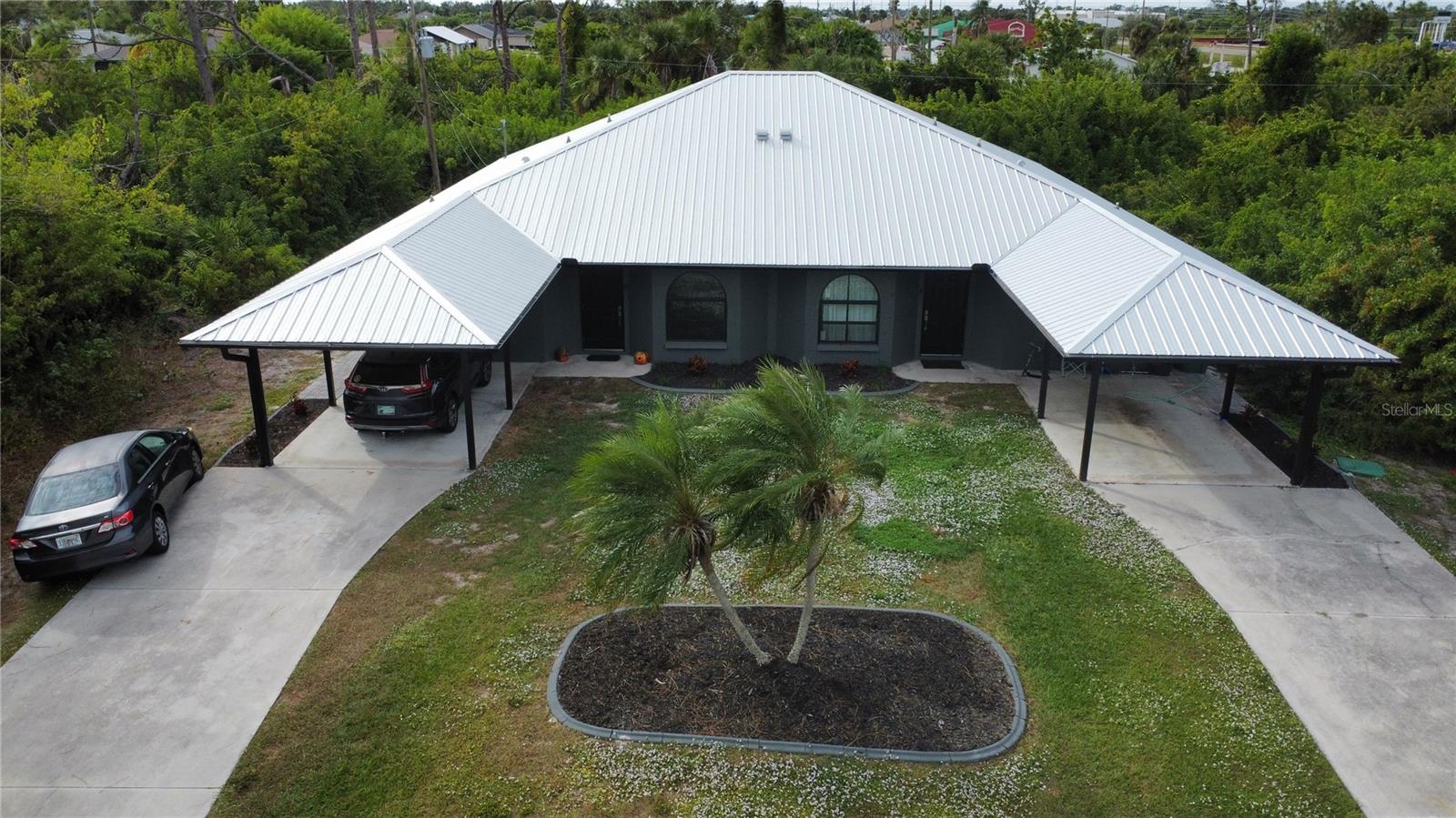 This charming 2-bedroom, 2-bath duplex in Englewood, FL, has been completely updated and is ready to move in. Featuring a new metal roof and impact-insulated windows. Inside, fresh paint throughout complements the modern updates. The master bedroom offers ample space, a large walk-in closet, and sliders that open to a private screened-in lanai—perfect for relaxing. The second bedroom also has its own ensuite with a walk-in shower for added convenience and privacy. Situated in a peaceful, quiet neighborhood, this property is centrally located—just 15 minutes to Englewood Beach and Boca Grande, offering easy access to everything the area has to offer.
