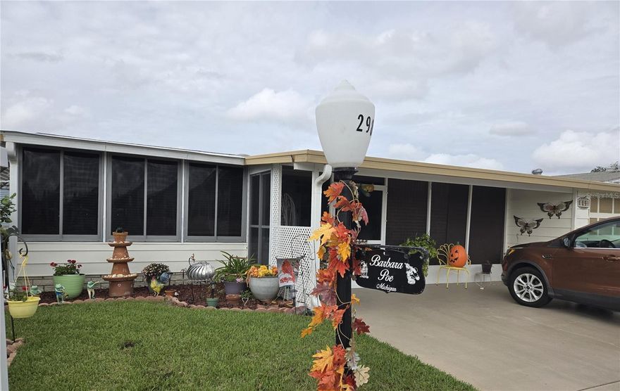 Own your own land in this Resort Style Community! This house is fresh with a new roof, 2016 AC, updated bathrooms, and has a screened lanai all across the front of the home, skylights (new with roof) that lets in all the natural light! All walls and ceilings are textured! Large living room is open to the dining room and kitchen, and wide open to the front Florida room which is on the house AC. No Grey Pipe! The bonus rooms supply bedroom 3, a LARGE undefined room currently being used as an office and sewing room, plus the biggest storage room you can imagine! Partially furnished including all appliances. Review the pictures and watch the Walk-Through Video, then schedule your appointment to come see this unique delight! MOTIVATED SELLER. In this very friendly community, you can be as active or inactive as you choose! Enjoy 18 holes of golf for just $5 green fees in this Gated, Golf Community, located just outside of the city, and approx. 1.25 hr from either coast. Great access to Disney, Legoland, and BOK Tower, just to name a few local attractions. Gatherings at the private Pub or the Community Room, fishing on Lake Henry, gardening, pickle ball, tennis, golf, shuffle board, horseshoes, swimming in the heated pool, enjoy the hot tub or the workout room! Contact this community's website for documents, including Rules/Regs, Application, Financial, and Bylaws. HOA INCLUDES a DVD Recorder and 2 BOXES FOR HD CABLE plus INTERNET! **55+ community with minimum age required is 50; rental max period 6 month out of a year.**