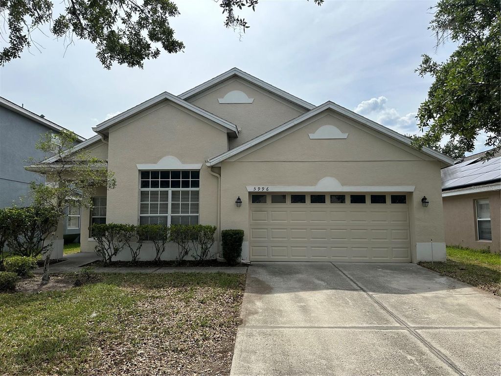 Photo of 5996 Milford Haven Place, Orlando, FL 32829 (MLS # O6406421)