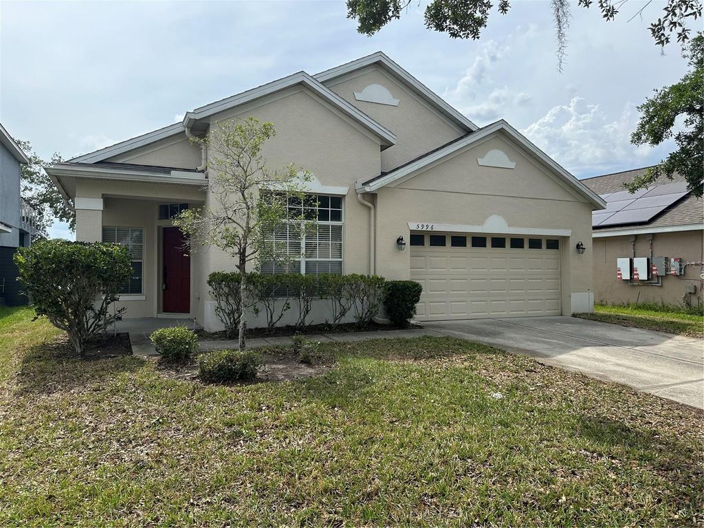 Photo of 5996 Milford Haven Place, Orlando, FL 32829 (MLS # O6406421)