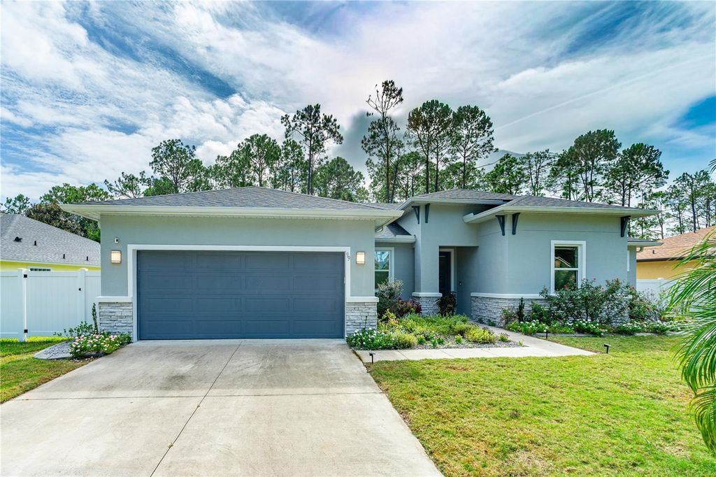 Photo of 99 Patric Drive, Palm Coast, FL 32164 (MLS # FC313336)