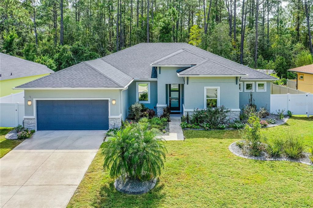 Photo of 99 Patric Drive, Palm Coast, FL 32164 (MLS # FC313336)