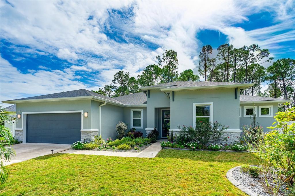 Photo of 99 Patric Drive, Palm Coast, FL 32164 (MLS # FC313336)