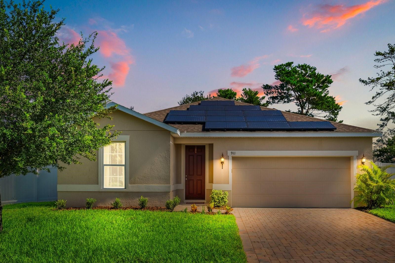 Welcome to this modern 3 bedroom 2 bathroom Ryan home built in 2018 in the quiet community of Shadow Ridge. Enjoy huge energy savings with OWNED not LEASED solar panels and a low electric bill. Inside you’ll find new luxury vinyl plank flooring throughout the main living areas, granite countertops in the kitchen and bathrooms and a modern open floor plan filled with natural light. It’s perfect for both everyday living and entertaining. The spacious fully fenced backyard offers plenty of room to relax or play and the home also comes equipped with hurricane shutters for added peace of mind. This home is conveniently located near Publix, Starbucks, Target and Kohl’s, with easy access to I-4 for commuting. You’re also just minutes from Blue Spring State Park where you can kayak, watch manatees or enjoy the bike trails. Disney World is about 50 minutes away, while Daytona and New Smyrna beaches are just a short 35 minute drive. Zoned for A rated schools, this home offers energy efficiency, comfort and a great Central Florida lifestyle.
