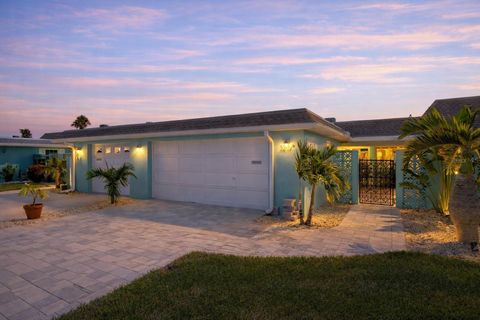 Photo of 328 Boca Ciega Point Boulevard S, St Petersburg, FL 33708 (MLS # TB8448237)