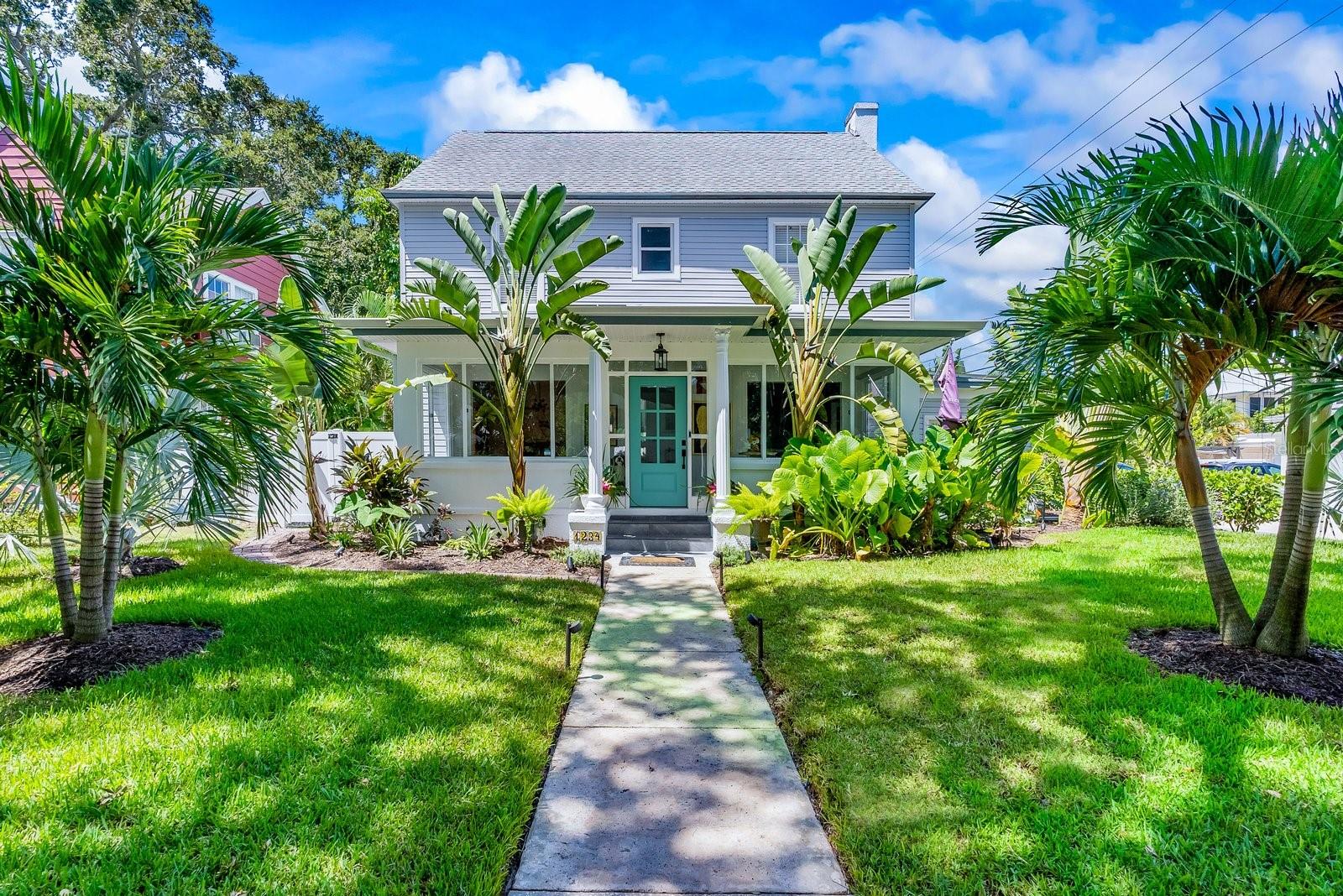 Experience the beauty of St. Petersburg living in this exquisite luxury residence that perfectly captures the essence of southern colonial charm elevated by modern design updates and elements. Nestled on a distinguished brick road, this grand estate of main house, pool, and guest house, boasts expansive proportions, towering ceilings, and an ambiance tailor-made for unforgettable gatherings and entertaining.
The home's regal façade is complemented by the enchanting backdrop of century-old live oaks and the vibrant community of Euclid St. Paul, a well-guarded secret of St. Petersburg. Gorgeous original old growth oak and heart of pine hardwood floors bring a sense of warmth and peace throughout the home. A grand hand carved wood burning fireplace frames the large living room inviting friends to gather in this central space in the home. Immerse yourself in the beauty of nature through generous picture windows that frame views of the lush foliage and historic charm that define the neighborhood.
Step onto the sprawling, breezy porch that offers a front-row seat to the spectacular backyard oasis. Here, a saltwater pool heated by a gas heat system fires up ready for use all winter. The lush garden is enveloped by banana, coconut, lemon and other tropical palm trees. Enjoy fireside chats on starry nights by the backyard stone fire pit. A meticulously rebuilt casita with designer full bath, kitchen, and separate laundry, stands ready to host your extended family and friends in luxurious comfort, ensuring privacy and convenience for all.
Every detail of this home exudes sophistication and modern convenience. Recent upgrades include a new kitchen 2022, guest bathroom 2022, primary bathroom 2023, siding 2023, roof in 2018, a comprehensive electrical overhaul with new wiring and panel in 2019, and dual updates to the central air conditioning system in 2016 and 2019. The dwelling's energy efficiency is elevated by attic spray foam insulation, while the exterior is adorned with captivating landscape lighting that brings the outdoor spaces to life.
Experience the ease of a connected lifestyle as gas service powers the stove, dryer, barbecue, and pool heater. Even the whole-house generator stands ready to provide peace of mind in any situation. Dive into the future with a fully automated pool and lighting system that you can command from the palm of your hand through your smartphone.
Advanced technology continues to make its mark with a Ring doorbell system, security cameras, and the Nest thermostat, seamlessly weaving modernity into your everyday life and contributing to your monthly savings.
Located just moments away, indulge in a leisurely stroll past historic residences to reach Left Bank French Cafe for brunch, Hooks sushi, Uptown Eats Coffeehouse, and the captivating Articles art gallery with regular events you can walk to. Discover the convenience of a central location that places highways, St. Anthony's Hospital, Tampa International Airport, and downtown St. Petersburg all within easy reach.
Positioned proudly on a fully fenced corner lot, this residence stands tall and dry, elevated 27 feet above sea level. Here, luxury living meets smart technology, history intertwines with modernity, and the charm of the past coexists harmoniously with the excitement of today. Don't miss the opportunity to call this exceptional property your new home.