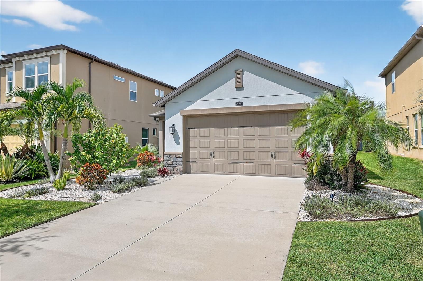 Priced to SELL!! Welcome Home to Estancia at Wiregrass
Step inside and imagine your life unfolding in this beautiful 3-bedroom, 2-bathroom Standard Pacific home nestled in the heart of Wesley Chapel. From the moment you arrive, the glass door and stone exterior set the tone warm, elegant, and timeless.
As you walk through the door, the hidden foyer creates a sense of privacy, opening into a bright, open-concept living space. The kitchen is the heart of the home, with quartz countertops, 42-inch cabinets, a gorgeous backsplash, and stainless-steel appliances with a reverse osmosis water-softening system. Whether it’s preparing weeknight dinners or hosting friends around the central island, this space was designed to bring families and friends together.
The dining and great room flow seamlessly out to the screened-in patio your personal retreat where morning coffee feels peaceful, and evenings with loved ones feel like a celebration.
The split floor plan offers both comfort and privacy. The primary suite feels like a getaway with its tray ceiling, spa-inspired bathroom, oversized walk-in shower, and a closet designed to keep life organized. On the other side of the home, two spacious bedrooms share a full bathroom, making it perfect for family, guests, or even a home office.
Life in Estancia at Wiregrass is more than just owning a home it’s a lifestyle. Friendly neighborhood,Resort-style amenities await, including a 7,000 SF clubhouse with clubroom and meeting room, an aquatic center with zero-entry pool and lap lanes, shaded cabanas, pool with water slide, state-of-the-art fitness center, tennis courts, basketball courts, parks, playground, walking trails, and more! With a social director, your calendar can be as full as you’d like from community gatherings to seasonal events.
This property sits in the A-rated school zone of Wiregrass Ranch with easy access to the interstate, premier shopping & dining, and just minutes from downtown Tampa and Gulf Coast beaches. Convenience and Florida lifestyle living at its finest. Low HOA fee, No Flood Zone!