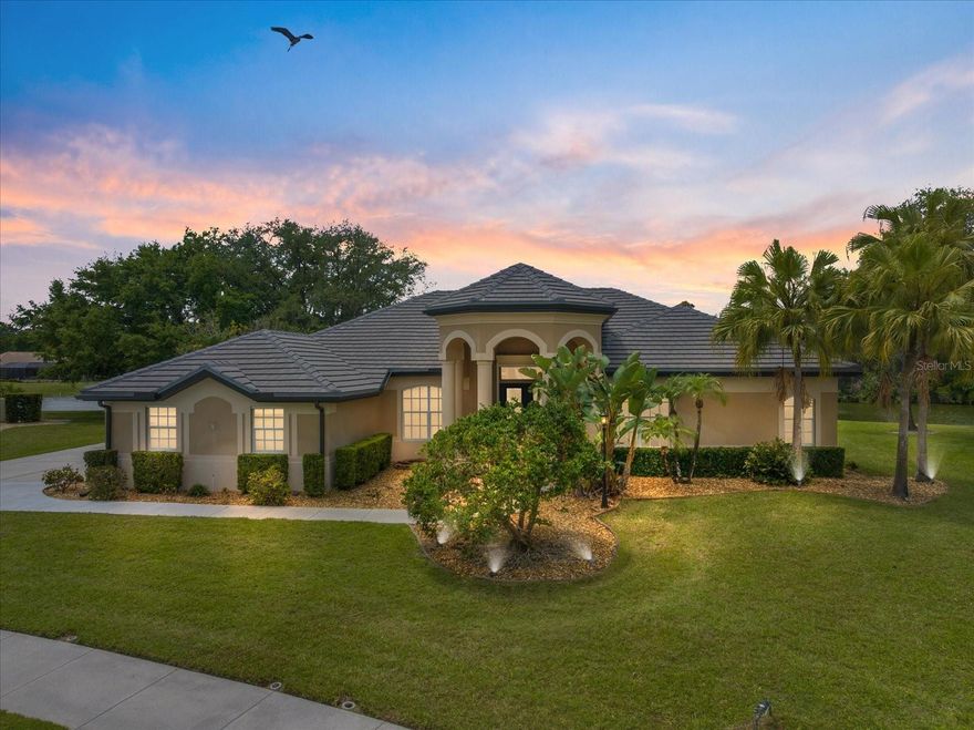 One or more photo(s) has been virtually staged. OVERSIZED LAKE LOT with gorgeous views!!  This spectacular 4 bedroom, 3 bath Misty Creek home is waiting for you! This luxurious pool home is situated in a wonderful golf course community with fantastic views of a serene lake. Mature landscaping greets you as you walk up the impressive facade of this also 1/2 acre property. Many wonderful updates include 2025 ROOF, gutters, downspouts,  HVAC replaced in 2022 which has a transferrable warranty and UV light, Bosch refrigerator is a few months old, dishwasher 3 years old, some 2025 interior painting, NEW laminate flooring, carpet, NEW 2025 pool cage with a huge panorama screen and pool pump 2025. As you walk in the front doors, you are greeted with impressively high ceilings of the living area and full VIEW of the pool and  LONG RANGE LAKE through the panorama view screen. The tastefully done interior is pure elegance. To your left is the formal dining area where you are sure to have lots of memories with friends and family as you entertain them in your beautiful house. On through the Chef’s kitchen, you are greeted with sleek stainless steel appliances and plenty of countertops and cabinetry where you are sure to hone your skills as a Masterchef! This is the heart of your home that features an informal dining area as well as the main living area which overlooks the scenic pool and lake. The master bedroom overlooks the wonderful view of the pool and lake. The master bedroom will not disappoint with it’s high ceilings, carpet flooring and large walk-in closet. The master bathroom  has ceramic tile flooring, a fantastic bath, a walk-in shower, his and hers vanity sink, linen closet and separate water closet. The secondary bedrooms are perfect for your loved ones with a den that can be converted to a fifth bedroom as well or a mother in law suite or gameroom.  This new fully screened extended lanai with a private pool and spa allows you to relax your stresses away and also has new pavers. Take a splash in your pool and create beautiful memories with friends and family as you all enjoy the stunning lake view. There are some electric hurricane shutters on this home as well as a whole house backup GENERATOR which was replaced in 2022 that also has a buried gas tank that conveys with the property. Plenty of parking with a 3 car garage and larger driveway.   You do not have to be a member of the golf club to enjoy living in this beautiful home on this oversized lake lot.  Great location and close to everything Sarasota has to offer including Siesta Key beach, shopping, restaurants and more.