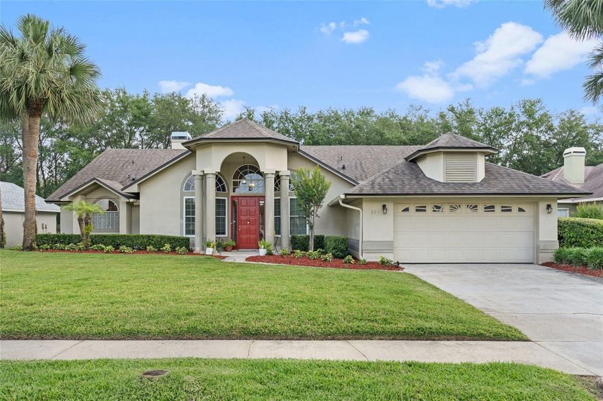 Welcome to Timacuan—one of Lake Mary’s most sought-after golf communities. This beautifully maintained pool home with screened enclosure showcases timeless Florida architecture with an arched entry, stately columns, and lush landscaping. Inside, soaring ceilings and abundant natural light create an open, airy feel, while the split floor plan offers both comfort and functionality. Spacious living areas flow seamlessly, making the home ideal for everyday living and entertaining. Dramatic vaulted ceilings and expansive clerestory windows flood the living space with natural light. Wood Burning Fireplace. Oversized sliding doors in family room. Set on an oversized lot, the backyard offers the perfect private retreat—enjoy Florida living year-round from your screened-in pool and outdoor space. Roof 2017. AC 2023. Water Heater 2023. Rain Gutters 2025. Termite Bond. Water Softener. Hardwood Flooring. Located within the desirable Timacuan Golf Community, residents enjoy access to an 18-hole course, driving range, dining, and social events, all surrounded by mature oak trees, scenic ponds.  Ideally situated in the heart of Lake Mary with easy access to I-4, SR-417, Downtown Orlando, and the Heathrow corporate corridor, plus top-rated schools, dining, and shopping just minutes away. Low HOA dues and low taxes add to the home’s overall appeal.
