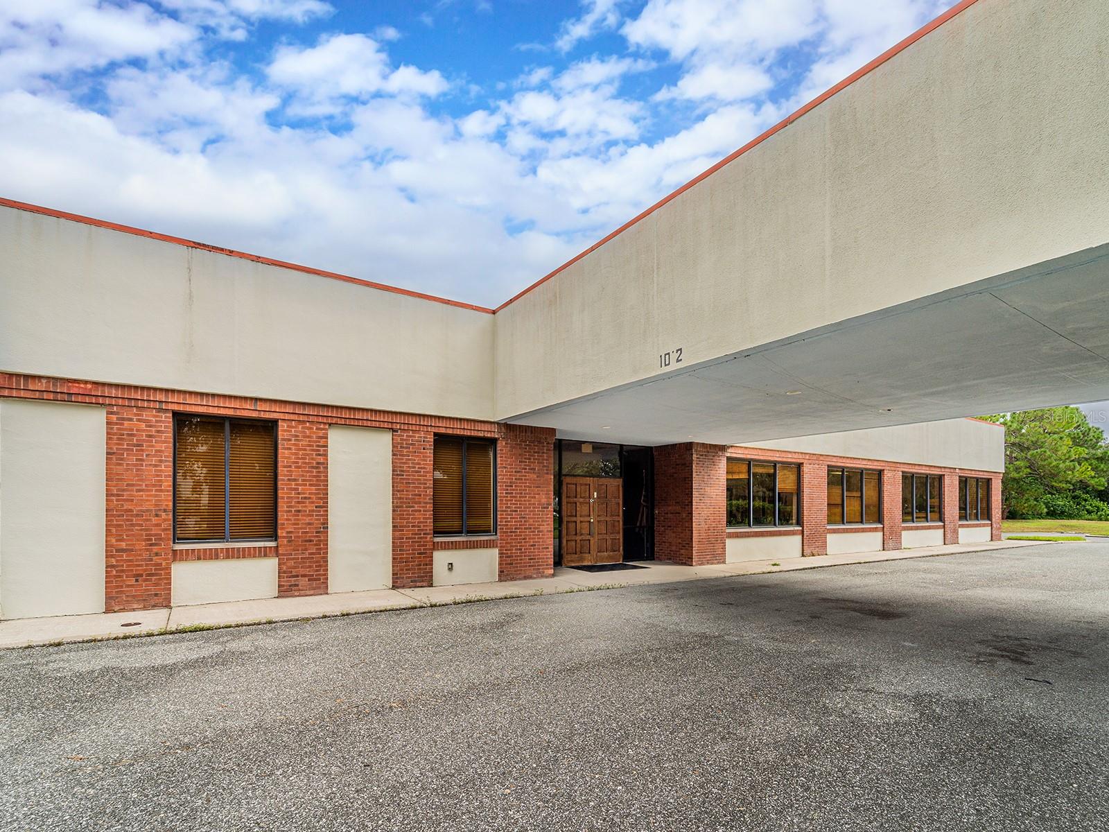 Excellent opportunity to own a versatile property in a quiet location on a dead-end street, offering privacy and safety—ideal for a child care center or daycare facility. Conveniently located near US-301 and I-75, the property provides easy access for commuting families and staff. Previously utilized for 11-12 classrooms, the interior space is well-suited for educational or childcare use. Outside, the expansive outdoor area offers ample room for recreation and can be segmented by age group to support a safe and enriching environment. This is a unique chance to secure a functional space in a growing area of Tampa.