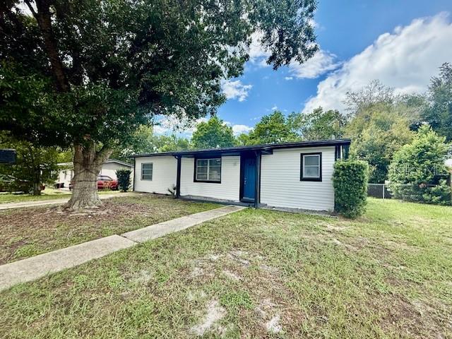 Charming & Fully Updated 2/2 Home with Split Floor Plan and Fenced Backyard in Deltona! Welcome to this beautifully renovated 2-bedroom, 2-bathroom home located in a quiet and convenient Deltona neighborhood. This move-in ready gem features a desirable split floor plan that offers privacy and flexibility. Step inside to find a modern interior with tasteful upgrades throughout, including updated flooring, contemporary lighting, fresh paint, and stylish fixtures. The kitchen shines with sleek countertops, stainless steel appliances, a brand new island and plenty of cabinet space. Both bedrooms are generously sized. The open living and dining area flows effortlessly, making it great for entertaining or relaxing. Enjoy outdoor living in the spacious, fully fenced backyard perfect for gardening or weekend barbecues. Located near schools, parks, shopping, and major highways, this home offers the perfect blend of comfort, style, and accessibility.