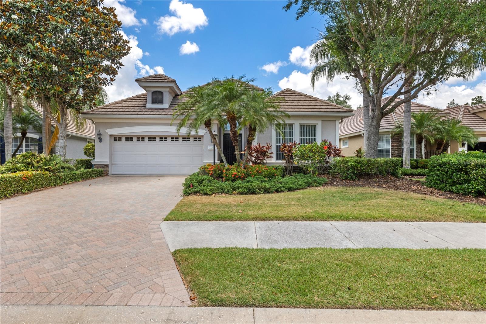 One or more photo(s) has been virtually staged. PRICE IMPROVEMENT! RARE OPPORTUNITY IN LAKEWOOD RANCH GOLF & COUNTRY CLUB - Experience Resort-Style Living in this Tranquil Pool Home on an Over-Sized Lot with Lake Views on Peaceful Cul-de-Sac! Featuring a New HVAC & Virtually Staged to Inspire! Discover luxurious Florida living in this meticulously maintained Neal Custom Manaco home nestled on a quiet cul-de-sac with lake views. This 3-bedroom, 2-bath residence with a formal dining room (or den/office space), offers the perfect balance of comfort and sophistication with 2,235 square feet of thoughtfully designed living space. PREMIUM UPGRADES include a brand-new, high-efficiency AC system ($15,000 value) ensuring year-round comfort and energy savings. The resurfaced saltwater pool and spa feature a new heater ($11,000 upgrade) for perfect temperature control year-round. Enjoy the versatile outdoor living space with an adjustable power awning providing shade at the touch of a button. The heart of this home features an open kitchen-to-great-room concept that flows seamlessly to the pool area, perfect for entertaining or peaceful relaxation while enjoying magnificent lake vistas. The luxurious owner's suite includes a convenient built-in office space, ensuite bathroom, and generous 2 walk-in closets. Two additional bedrooms on the opposite wing provide privacy and versatility for family or guests. Enjoy carefree living with HOA-covered lawn maintenance, fertilization, and pest control. Residents have access to Lakewood Ranch Country Club's world-class amenities including four championship golf courses, 18 tennis courts, pickleball facilities, fitness centers, and elegant clubhouses (membership optional & multiple membership choices currently available). Located in America's #1 multi-generational community, you'll enjoy proximity to premier shopping, dining, cultural attractions, A-rated schools, and beautiful Gulf beaches just minutes away. This property also QUALIFIES FOR A 1% LENDER INCENTIVE with preferred lender. (This home presents a great investment opportunity, as the sellers are open to a leaseback arrangement for 6 months to 1 year.)
Don't miss this exceptional opportunity to own in one of Florida’s most sought-after communities and experience the premier Lakewood Ranch lifestyle - schedule your private showing today!