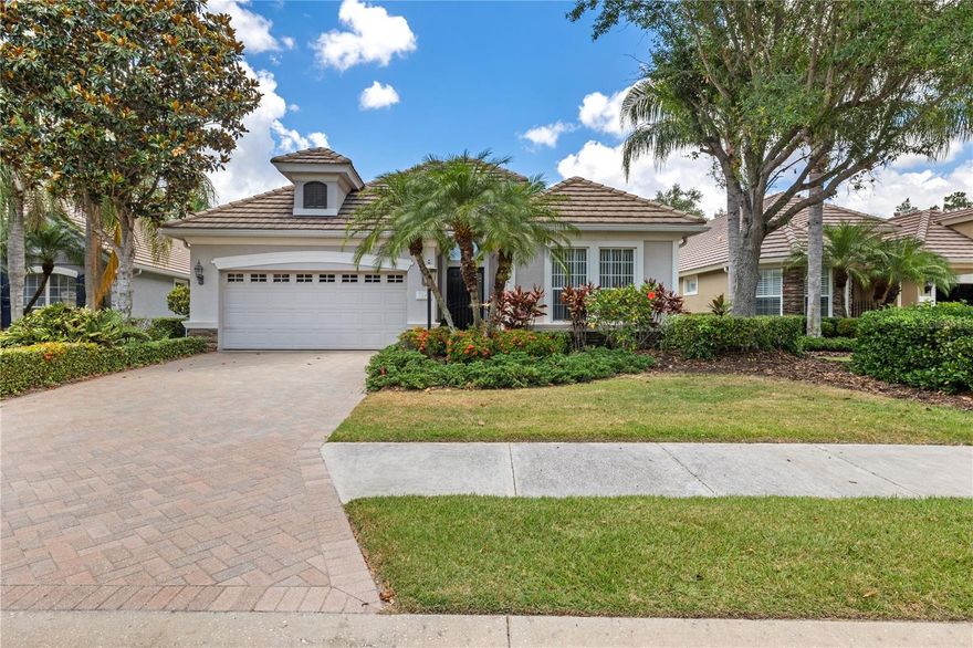 One or more photo(s) has been virtually staged. PRICE IMPROVEMENT – Now $640,000 | Motivated Sellers | Lakewood Ranch Golf & Country Club

The Area's Only Four-Course Private Golf & Country Club | 72 Holes of Golf. One Membership.

Welcome to Lakewood Ranch Golf & Country Club—where championship golf and world-class sporting facilities blend seamlessly with the easy comfort of good friends, great food, and beautiful surroundings. From morning golf rounds to holiday traditions and gorgeous sunset views overlooking lush Florida terrain, LWRG&CC delivers the refined lifestyle you've been seeking. Members enjoy unparalleled access to the area's finest golf. Choose from Golf, Fitness, or Social Memberships to customize your Country Club experience. Beyond the fairways, indulge in 18 tennis courts, pickleball facilities, multiple fitness centers, resort-style pools, and elegant dining venues that bring the community together.

Rare Cul-de-Sac Pool Home with Lake Views 

Nestled within the gated Country Club of Lakewood Ranch, Orchid Island is a maintenance-free neighborhood known for its beautiful homes. This tranquil Neal Custom "Monaco" model offers refined living on an oversized cul-de-sac lot with sparkling lake views. Thoughtfully designed with 3 bedrooms, 2 baths, formal dining room (or versatile den/office), and 2,235 sq. ft. of living space, this home delivers the perfect blend of comfort, style, and low-maintenance Country Club elegance.

Step inside to soaring 12-foot tray ceilings in the foyer and nearly 10-foot ceilings throughout, enhanced by elegant chandeliers, wall sconces, and classic picture frame molding that add timeless character. The open kitchen-to-great-room floor plan flows seamlessly to the screened lanai and outdoor living area—ideal for entertaining or quiet evenings overlooking the lake.

Premium Upgrades & Move-In Ready Comfort

NEW high-efficiency HVAC system ($15,000 value) for year-round comfort and energy savings
Resurfaced saltwater pool & spa with NEW heater ($11,000 value) for perfect temperatures in every season
Adjustable motorized awning for instant shade over the pool deck
Owner's suite with built-in office niche, ensuite bath, and two walk-in closets
Split bedroom floor plan with two guest bedrooms on a separate wing for added privacy
Open concept design connecting kitchen, great room, and outdoor spaces for effortless entertaining
Your Private Lakeside Retreat

The screened lanai is your personal sanctuary, featuring a heated saltwater pool, spa, retractable awning, and expansive seating area—perfect for morning coffee with serene water views or hosting sunset gatherings with friends and family.

Maintenance-Free Lifestyle

HOA fees include lawn care, fertilization, and pest control, giving you more time to enjoy everything Lakewood Ranch Golf & Country Club offers. Optional memberships provide access to four championship golf courses, tennis and pickleball courts, fitness centers, resort pools, and elegant dining venues.

Unmatched Location & Convenience

Situated minutes from University Town Center's premier shopping and dining, Lakewood Ranch Main Street, top-rated schools, cultural attractions, and Florida's award-winning Gulf Coast beaches including Siesta Key and Anna Maria Island.

This is your opportunity to own a premium pool home in one of Florida's most sought-after golf communities—at an exceptional value.

Schedule your private showing today and start living the Country Club lifestyle you deserve!